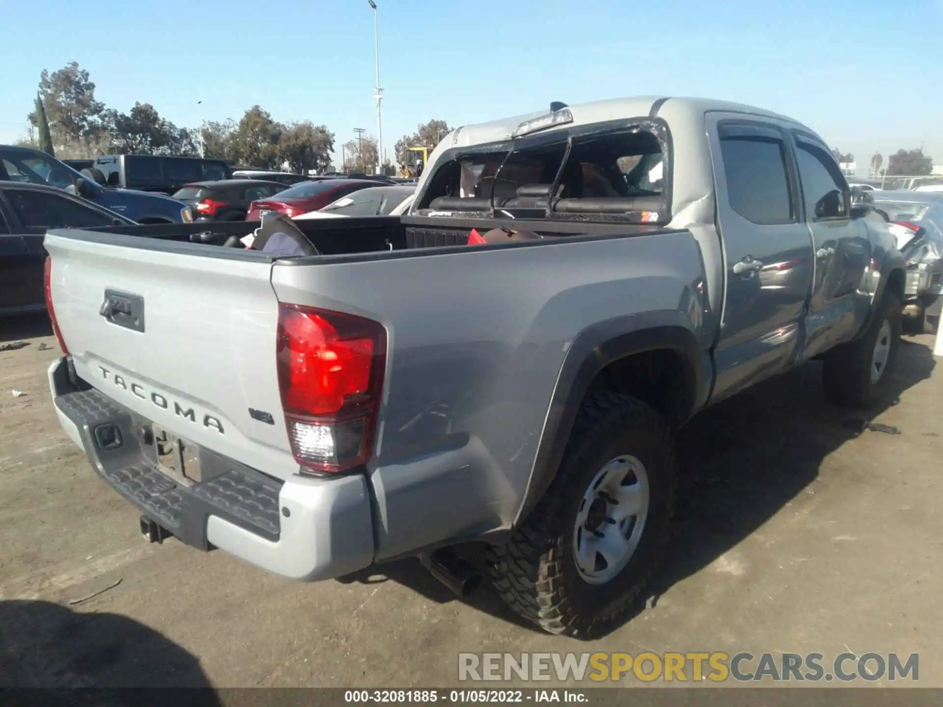 4 Photograph of a damaged car 3TMCZ5AN0KM257489 TOYOTA TACOMA 4WD 2019