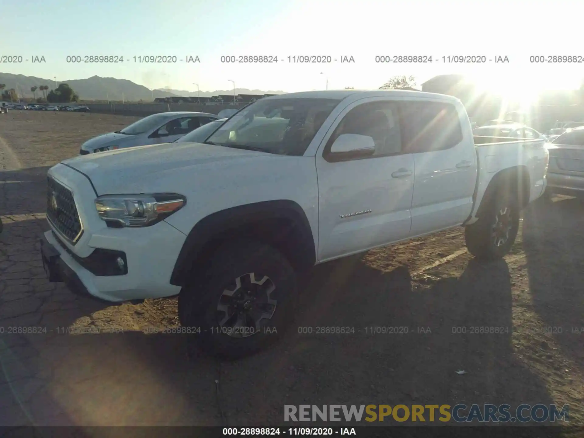 2 Photograph of a damaged car 3TMCZ5AN0KM258416 TOYOTA TACOMA 4WD 2019