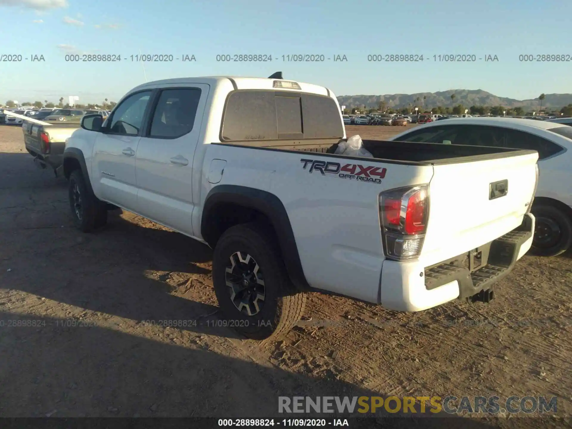 3 Photograph of a damaged car 3TMCZ5AN0KM258416 TOYOTA TACOMA 4WD 2019