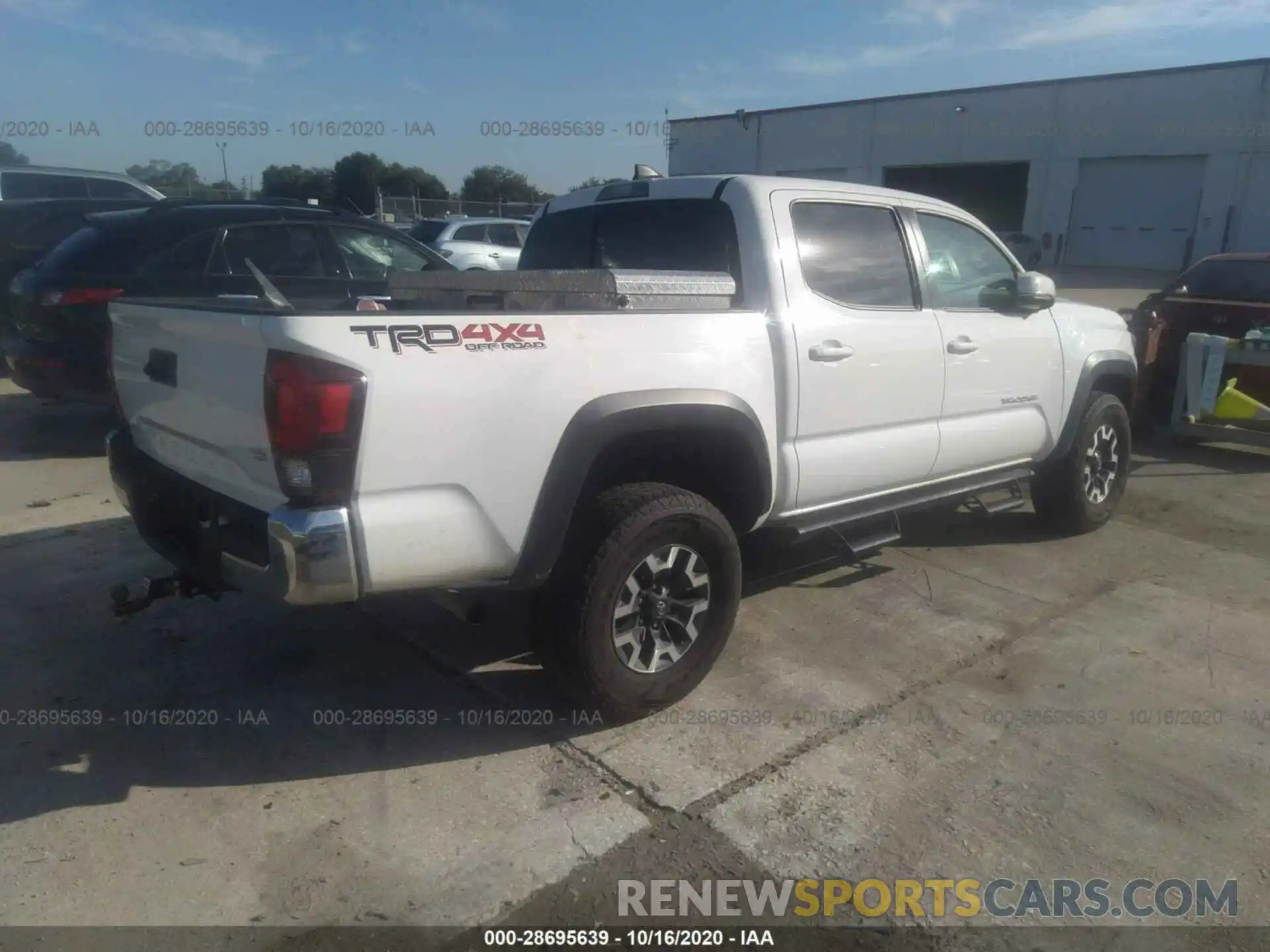 4 Photograph of a damaged car 3TMCZ5AN0KM260330 TOYOTA TACOMA 4WD 2019