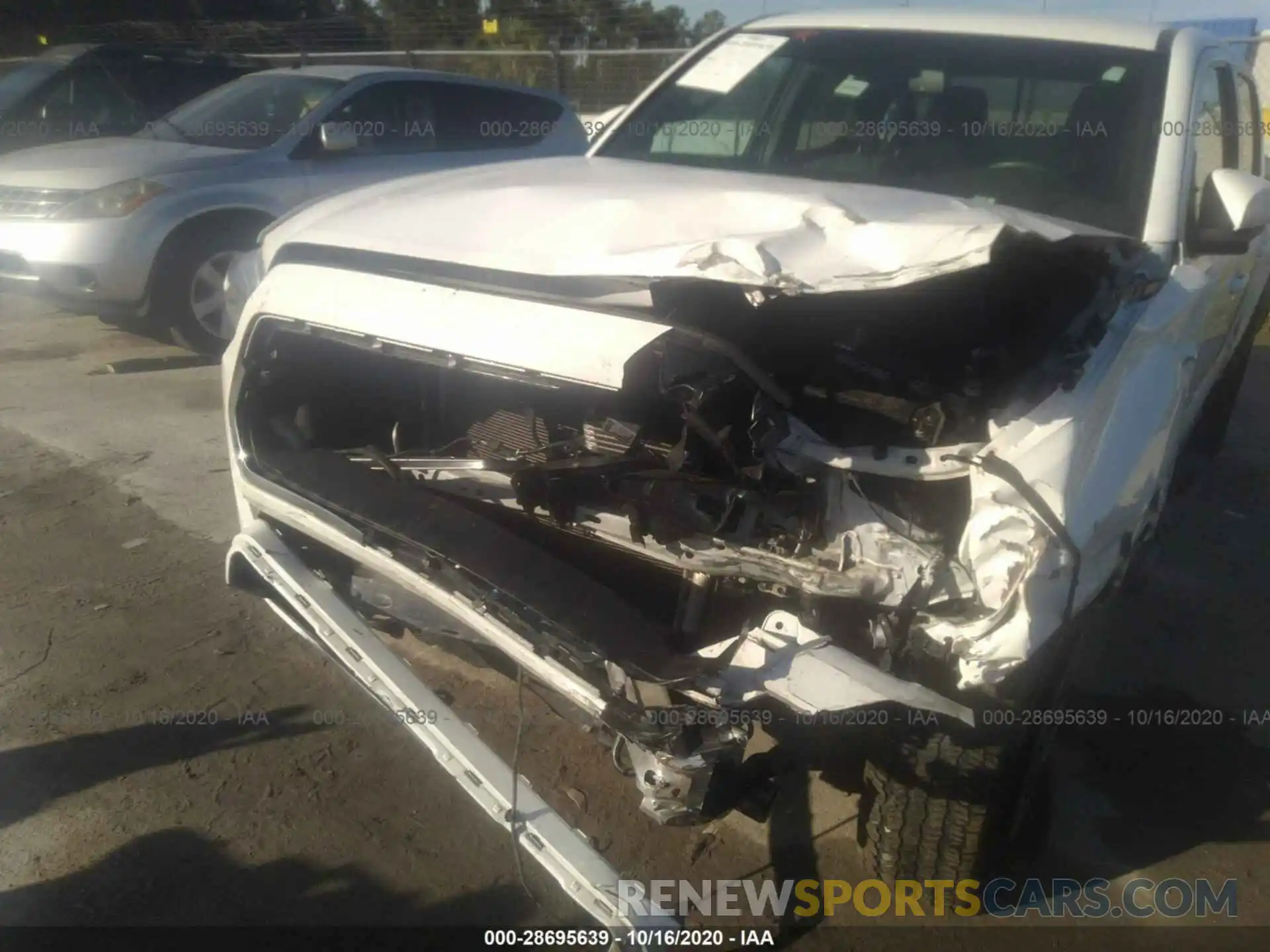 6 Photograph of a damaged car 3TMCZ5AN0KM260330 TOYOTA TACOMA 4WD 2019