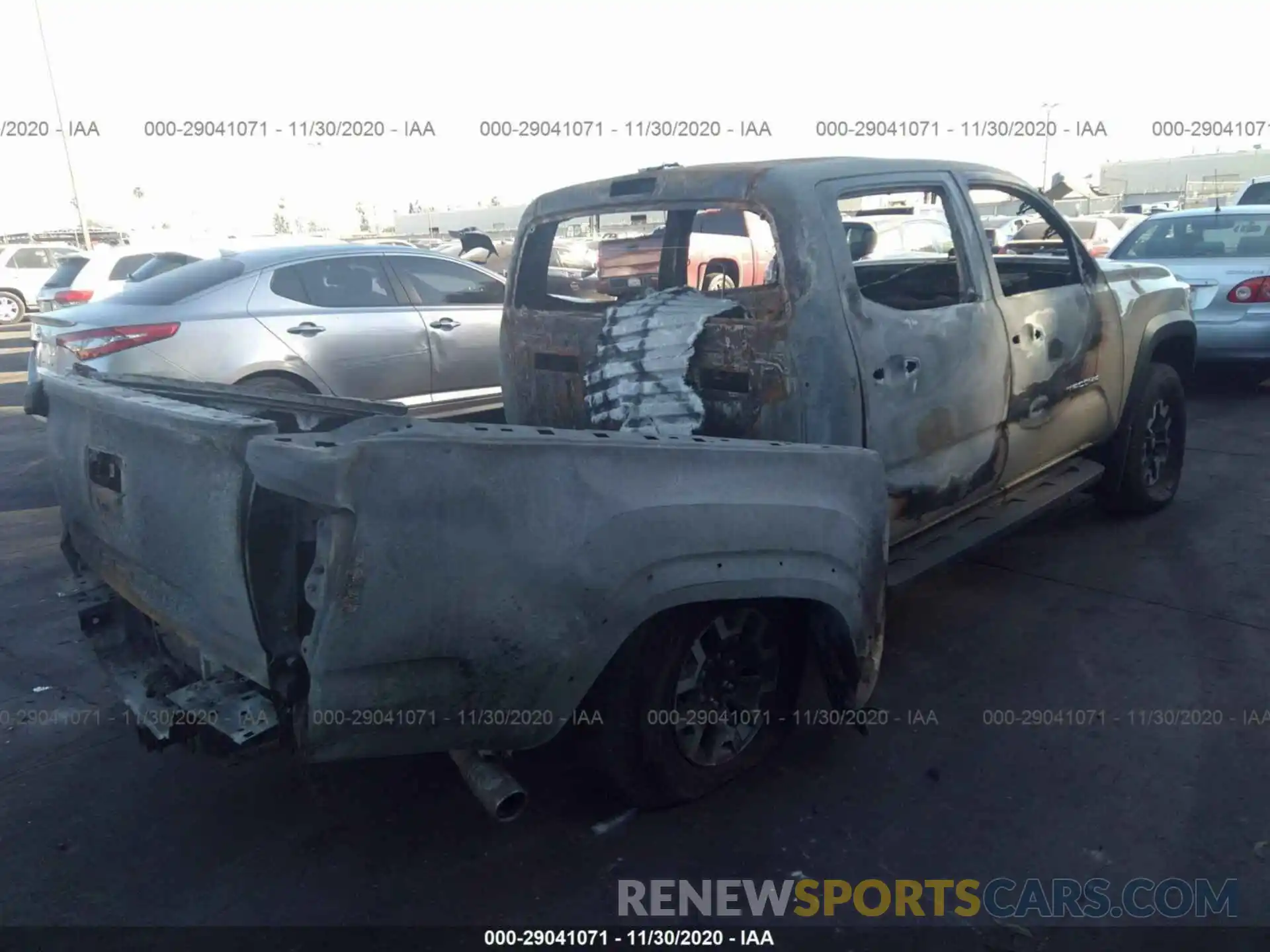 4 Photograph of a damaged car 3TMCZ5AN0KM267326 TOYOTA TACOMA 4WD 2019