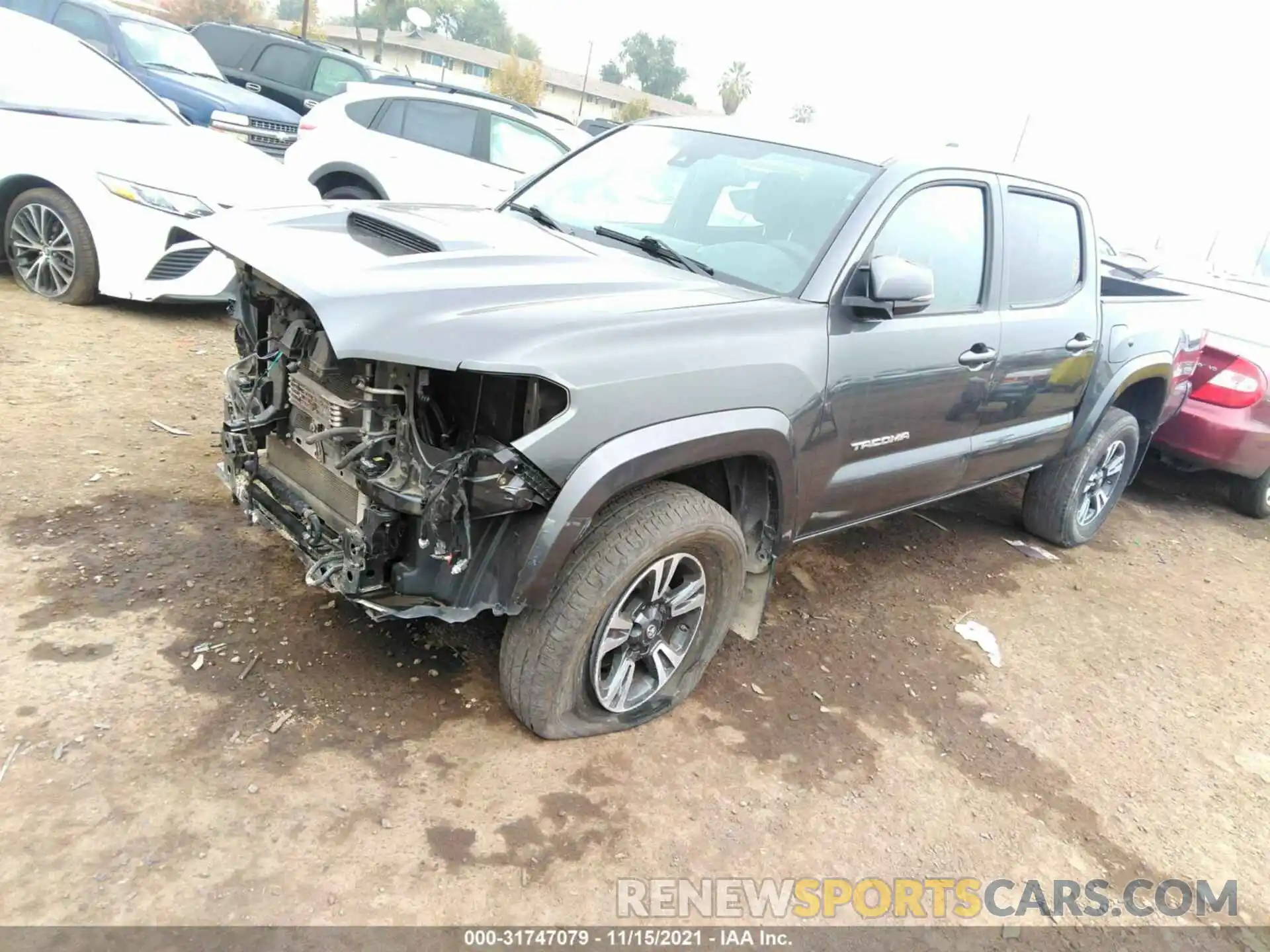 2 Photograph of a damaged car 3TMCZ5AN0KM274292 TOYOTA TACOMA 4WD 2019