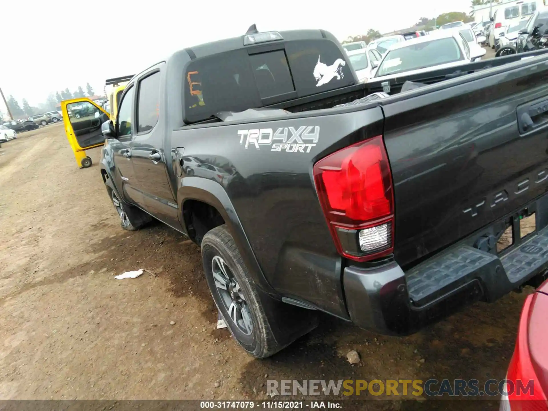 3 Photograph of a damaged car 3TMCZ5AN0KM274292 TOYOTA TACOMA 4WD 2019