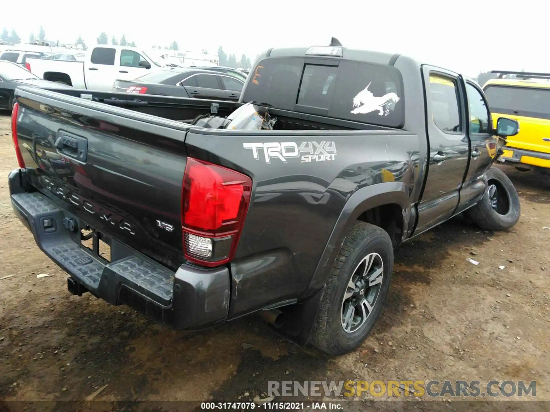 4 Photograph of a damaged car 3TMCZ5AN0KM274292 TOYOTA TACOMA 4WD 2019