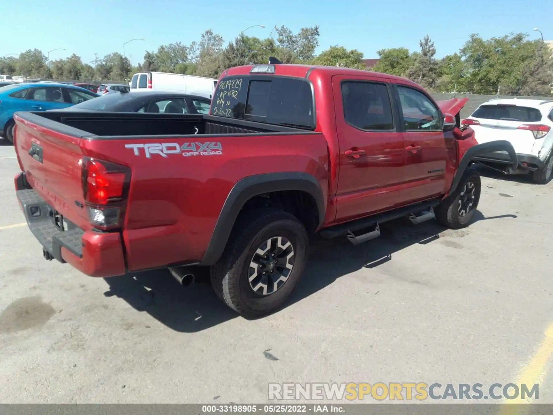 4 Photograph of a damaged car 3TMCZ5AN0KM284627 TOYOTA TACOMA 4WD 2019