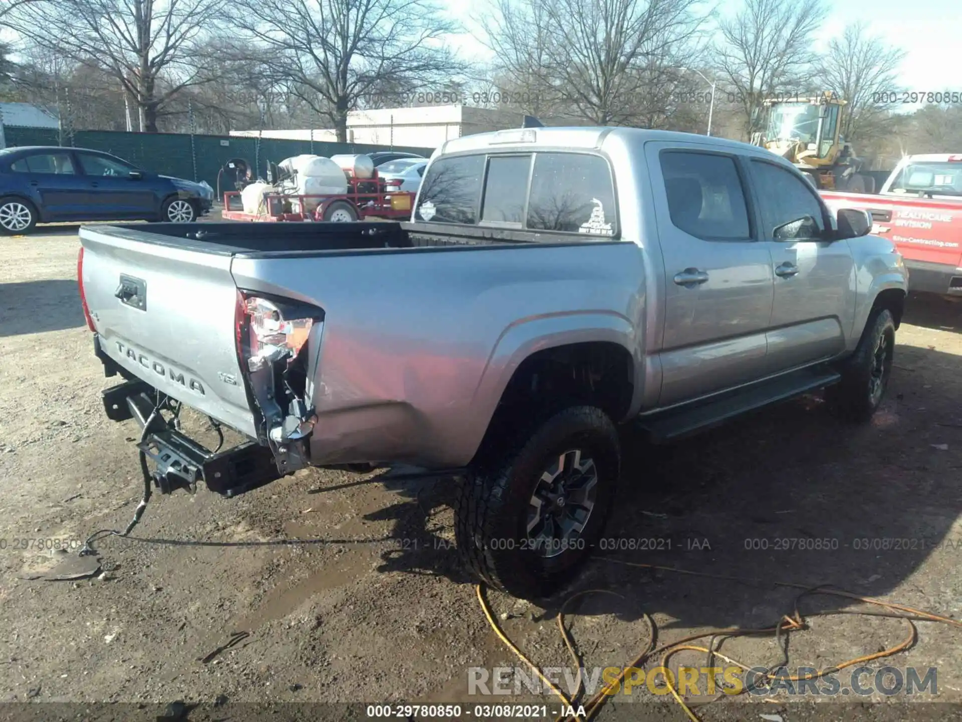 4 Photograph of a damaged car 3TMCZ5AN0KM284658 TOYOTA TACOMA 4WD 2019