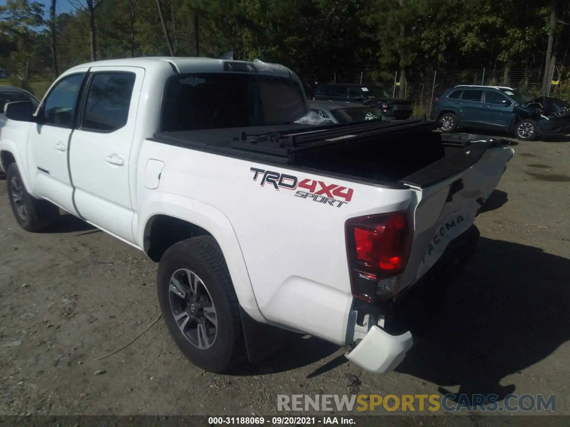 3 Photograph of a damaged car 3TMCZ5AN0KM285955 TOYOTA TACOMA 4WD 2019