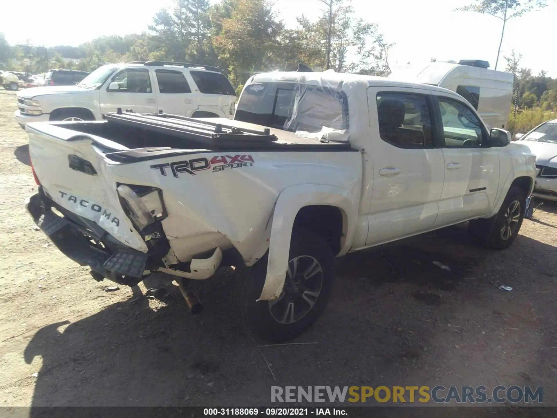 4 Photograph of a damaged car 3TMCZ5AN0KM285955 TOYOTA TACOMA 4WD 2019