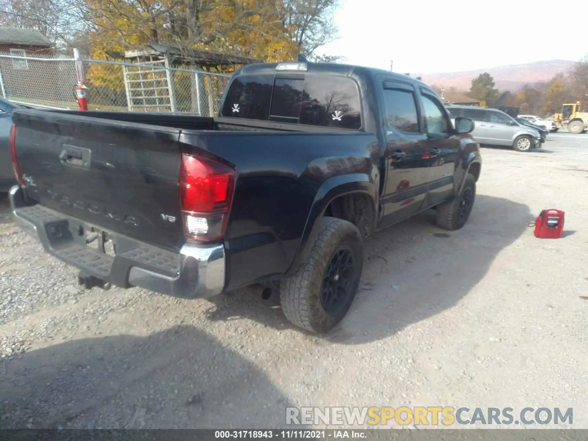 4 Photograph of a damaged car 3TMCZ5AN1KM190031 TOYOTA TACOMA 4WD 2019