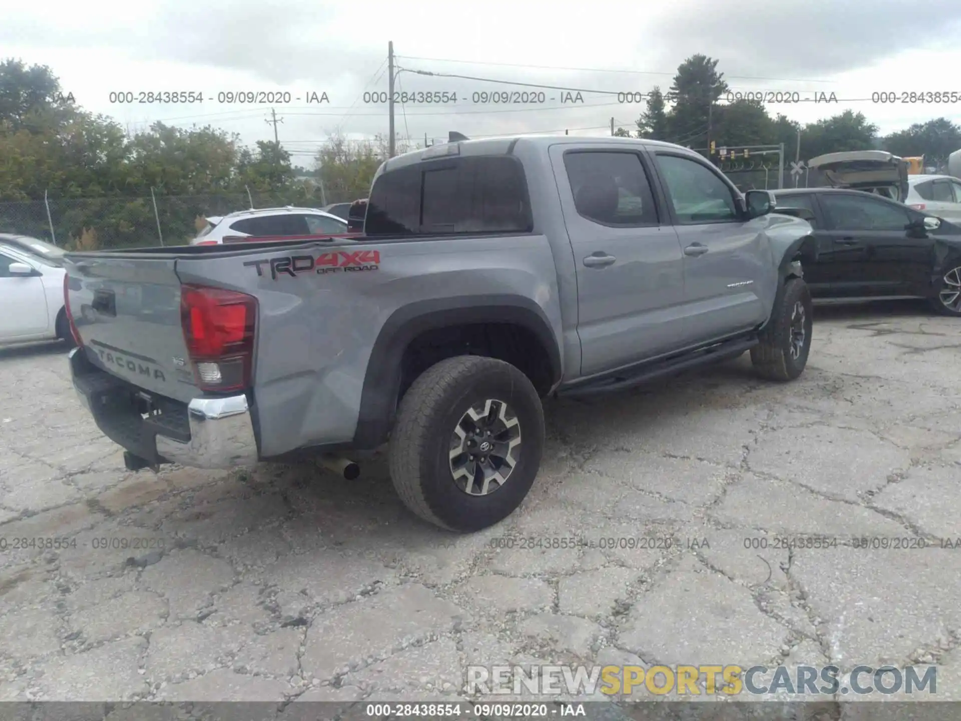 4 Photograph of a damaged car 3TMCZ5AN1KM192572 TOYOTA TACOMA 4WD 2019