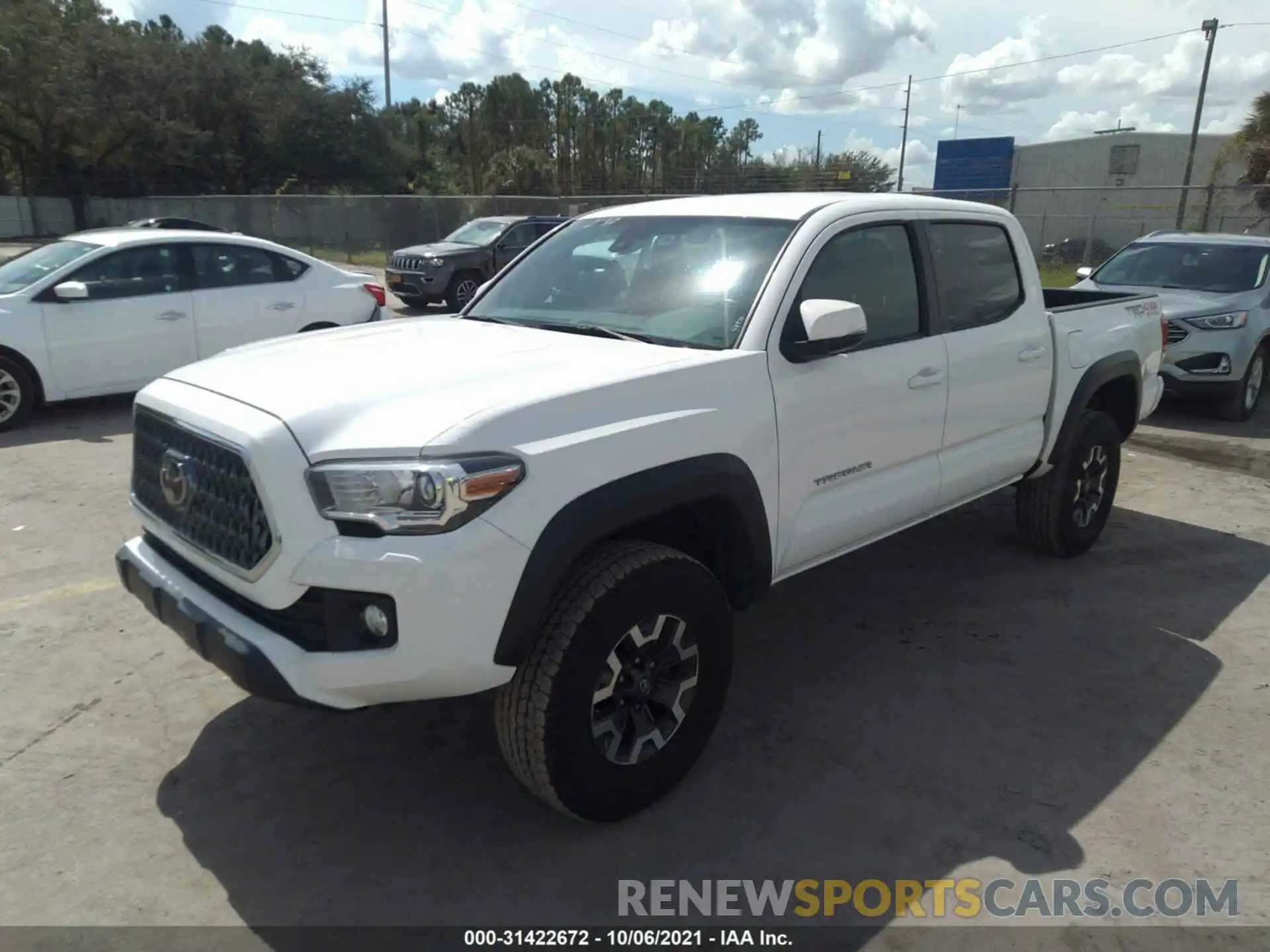 2 Photograph of a damaged car 3TMCZ5AN1KM201061 TOYOTA TACOMA 4WD 2019