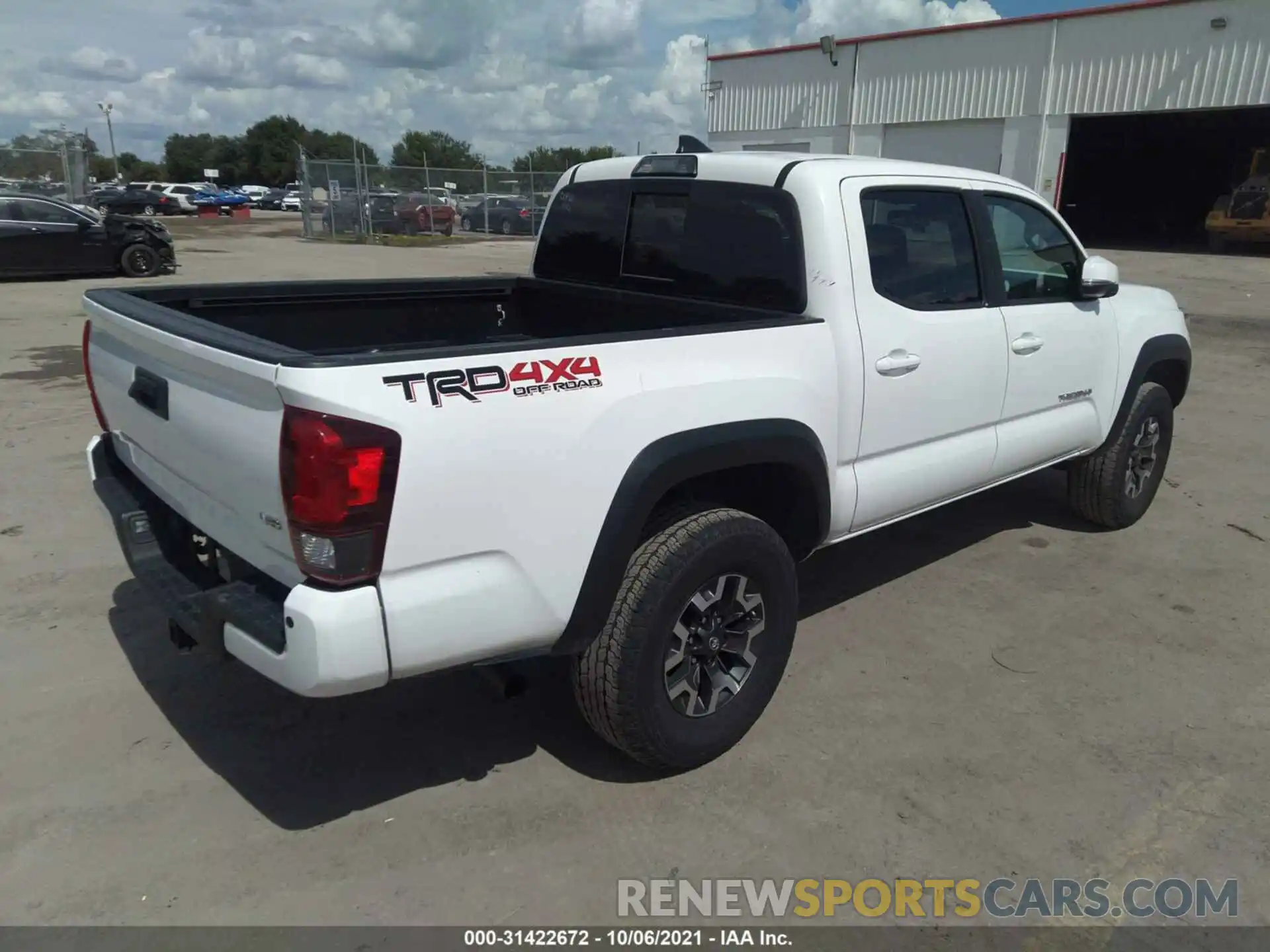 4 Photograph of a damaged car 3TMCZ5AN1KM201061 TOYOTA TACOMA 4WD 2019