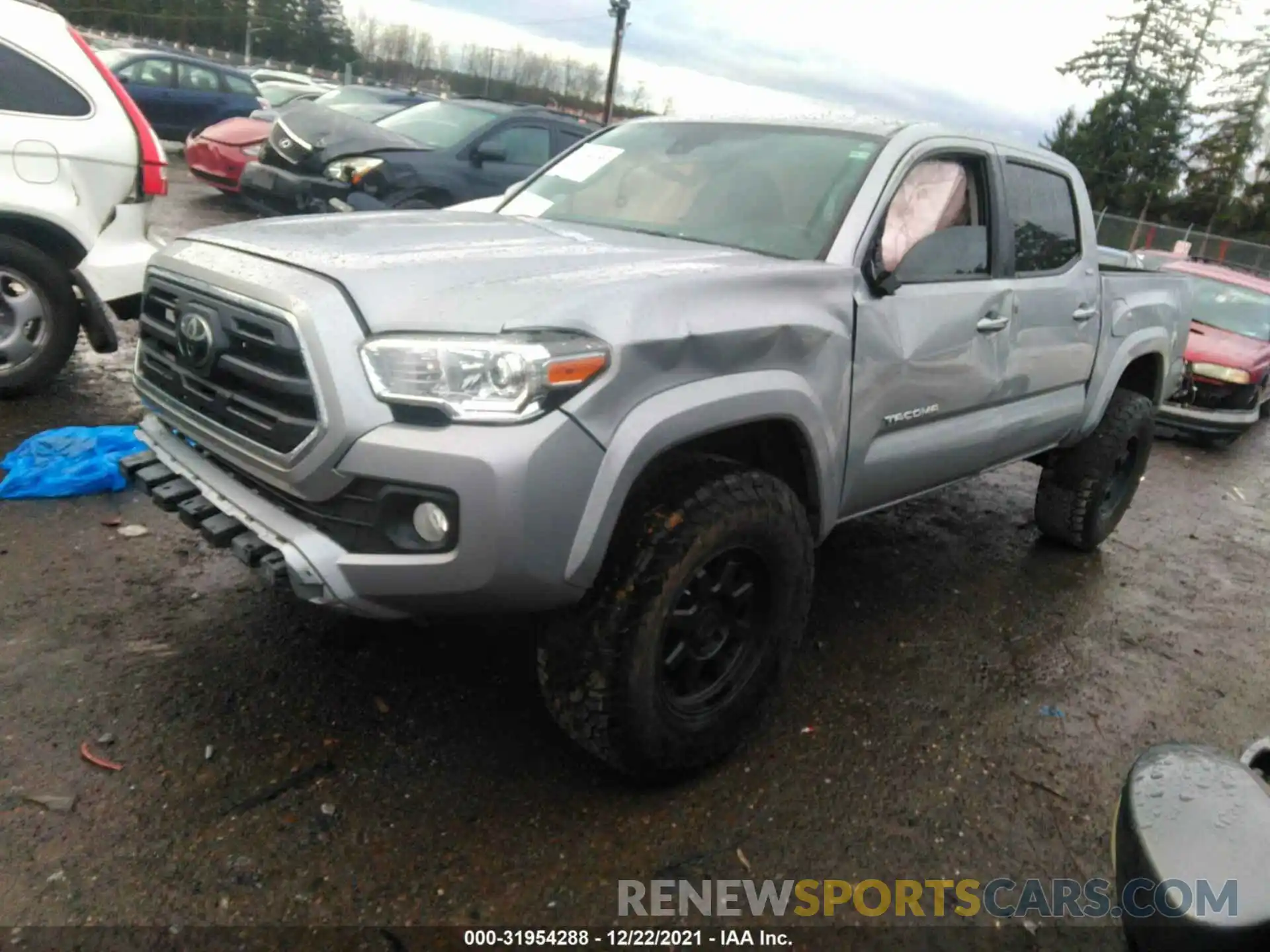 2 Photograph of a damaged car 3TMCZ5AN1KM208799 TOYOTA TACOMA 4WD 2019