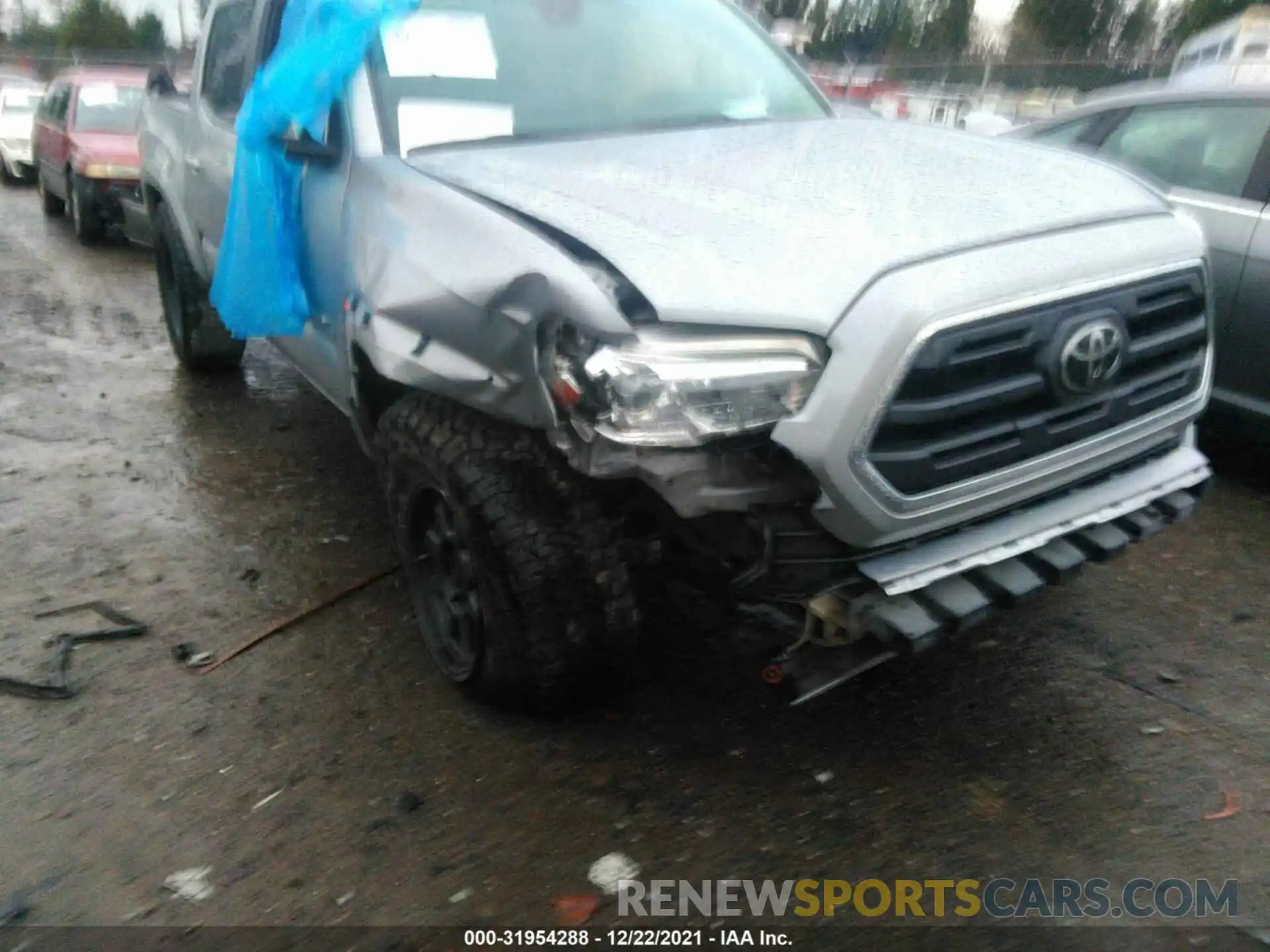 6 Photograph of a damaged car 3TMCZ5AN1KM208799 TOYOTA TACOMA 4WD 2019