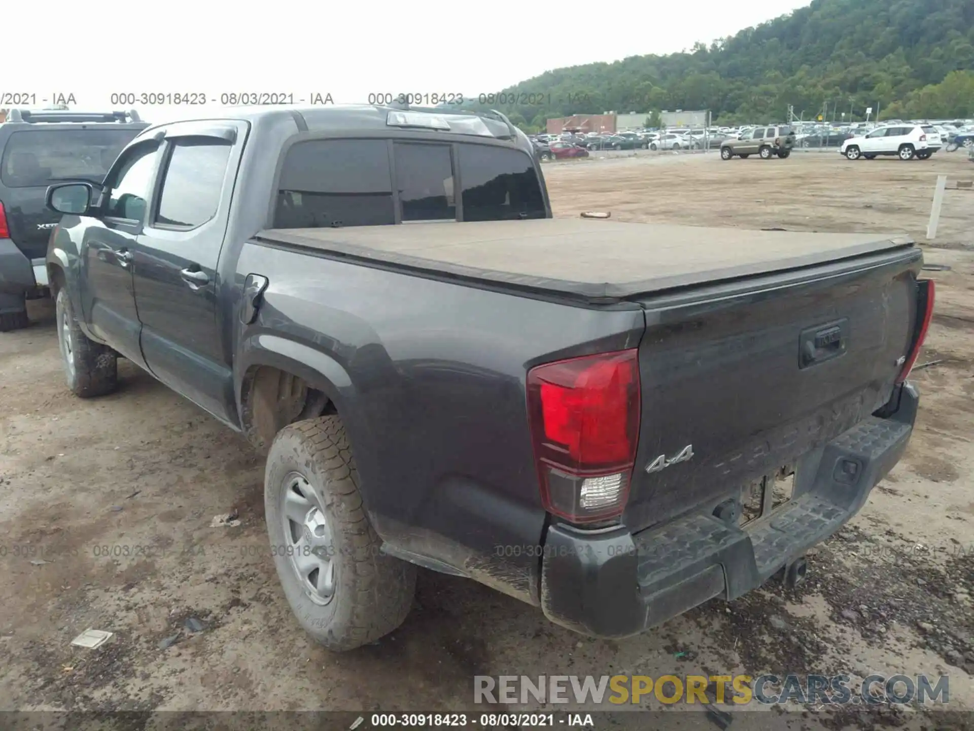 3 Photograph of a damaged car 3TMCZ5AN1KM209662 TOYOTA TACOMA 4WD 2019