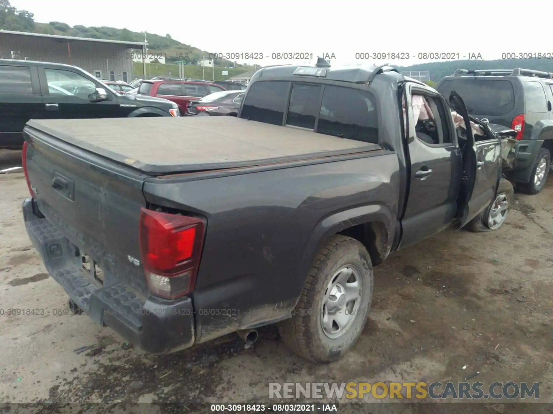 4 Photograph of a damaged car 3TMCZ5AN1KM209662 TOYOTA TACOMA 4WD 2019