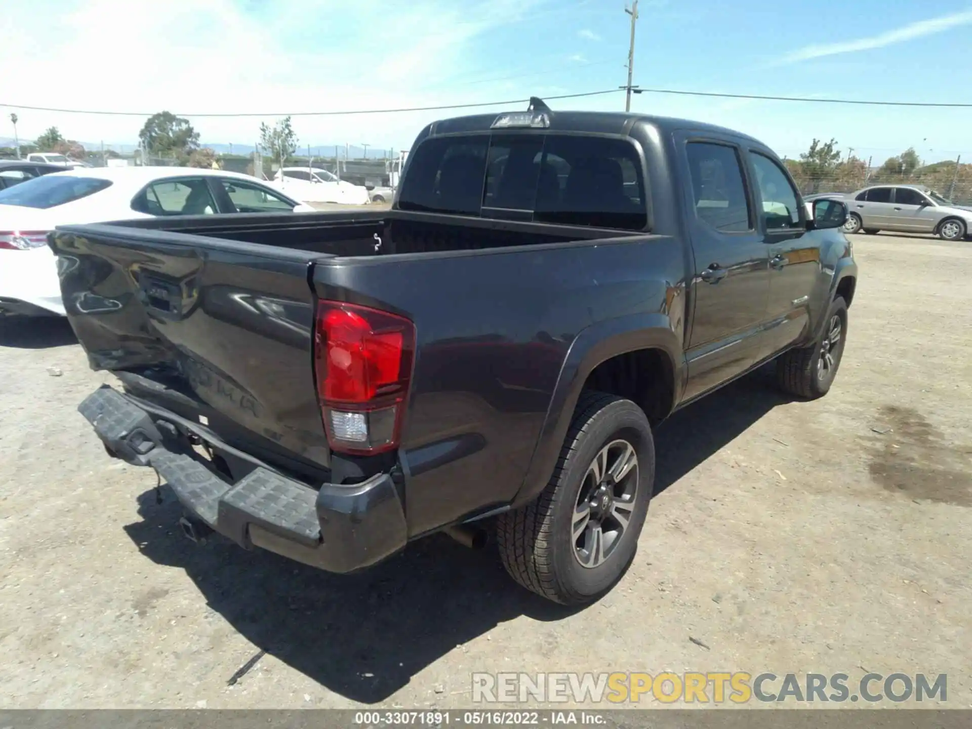 4 Photograph of a damaged car 3TMCZ5AN1KM216773 TOYOTA TACOMA 4WD 2019