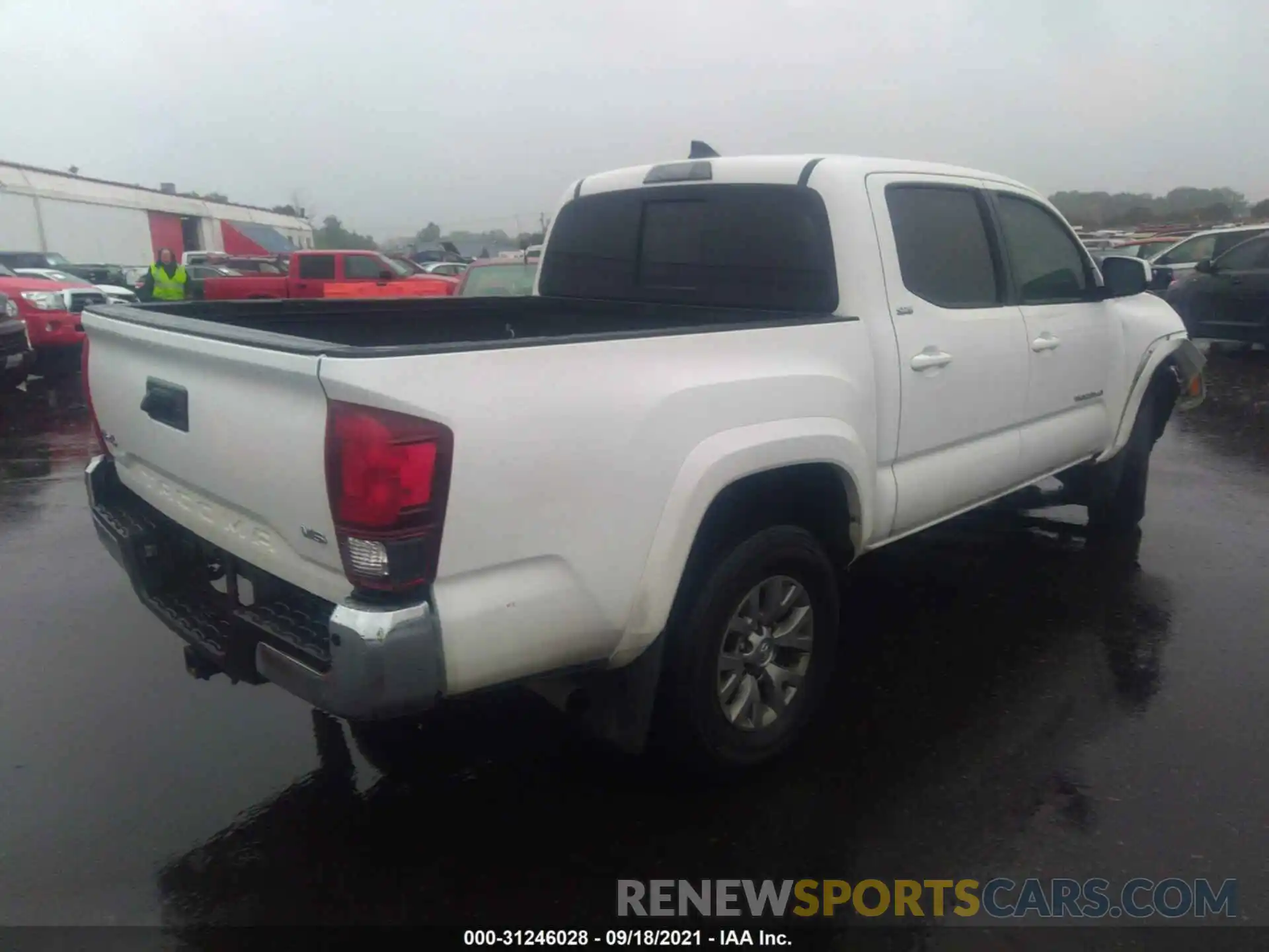 4 Photograph of a damaged car 3TMCZ5AN1KM224601 TOYOTA TACOMA 4WD 2019