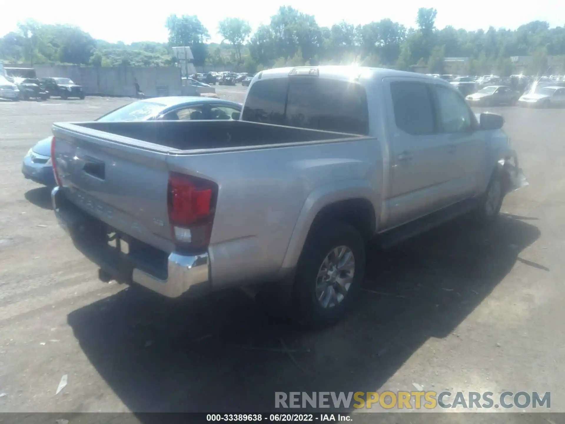 4 Photograph of a damaged car 3TMCZ5AN1KM233802 TOYOTA TACOMA 4WD 2019