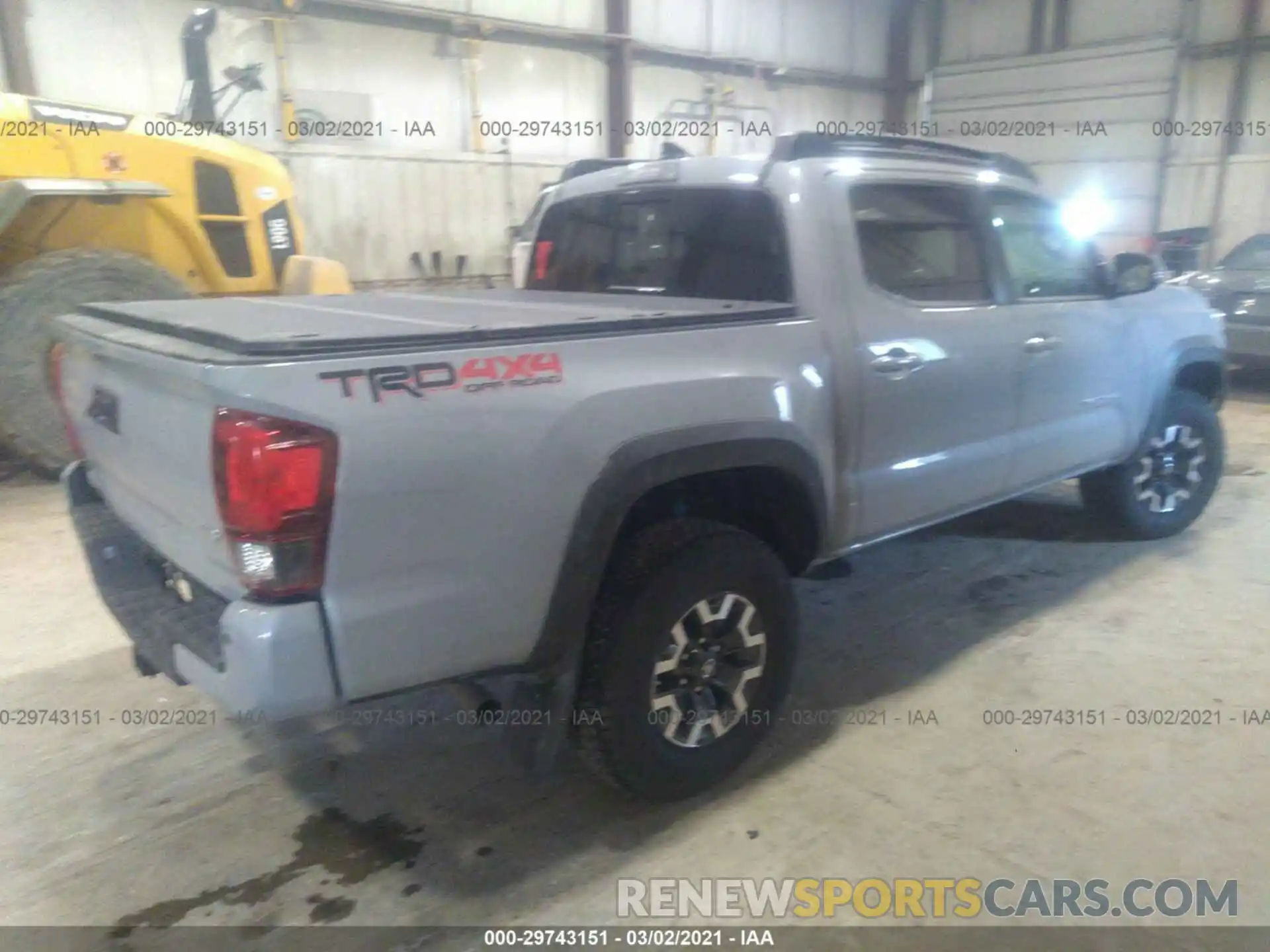 4 Photograph of a damaged car 3TMCZ5AN1KM245562 TOYOTA TACOMA 4WD 2019