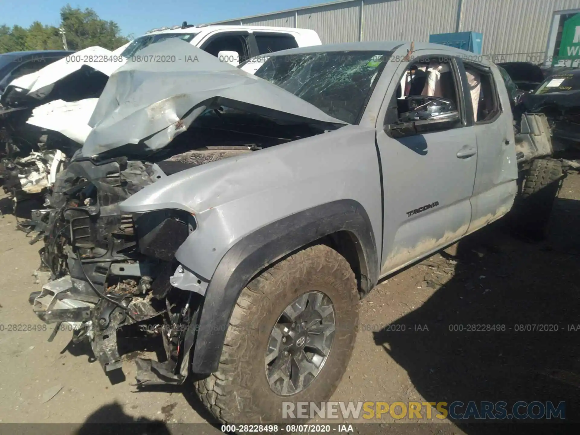 2 Photograph of a damaged car 3TMCZ5AN1KM249532 TOYOTA TACOMA 4WD 2019