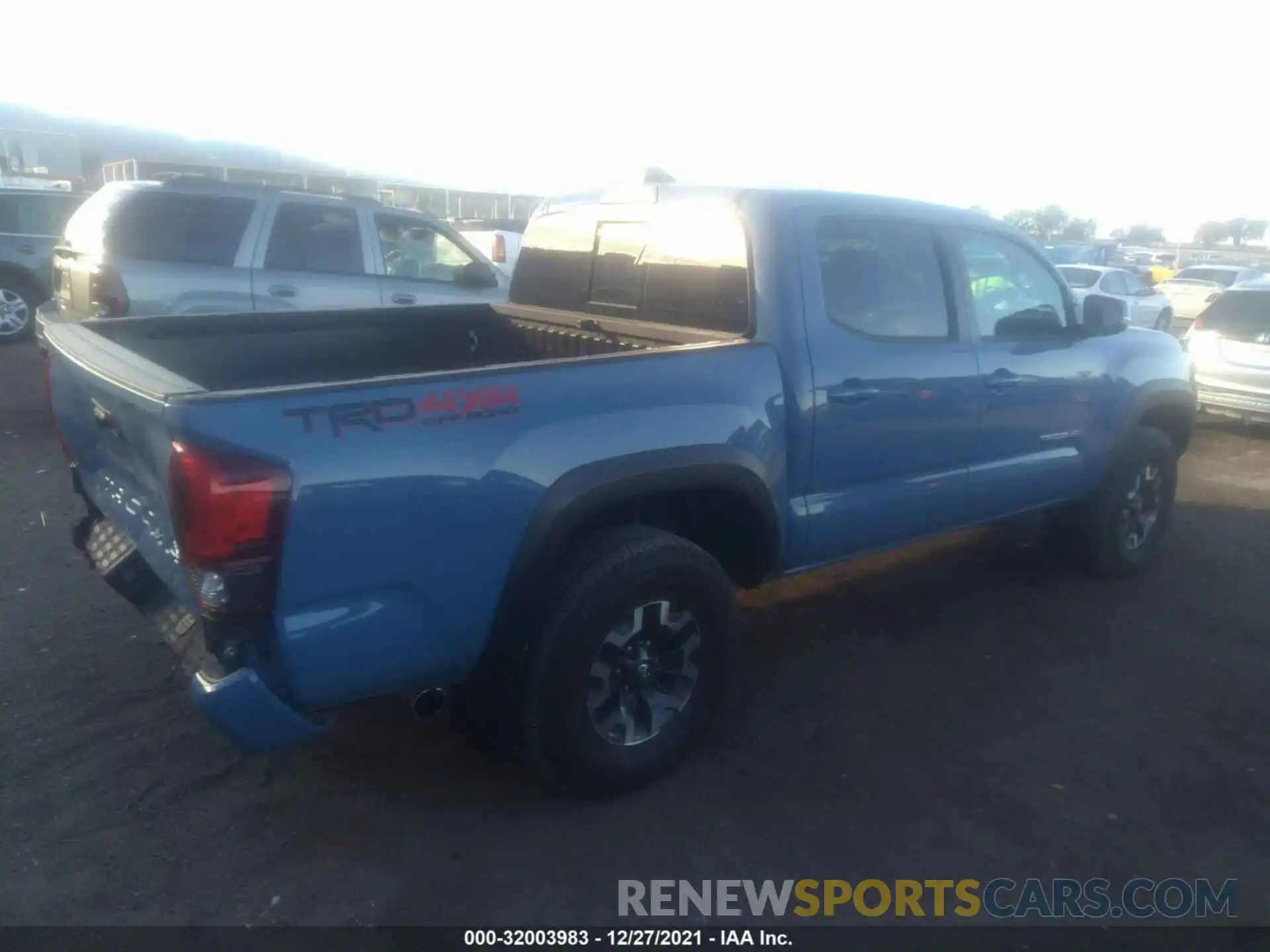 4 Photograph of a damaged car 3TMCZ5AN1KM259980 TOYOTA TACOMA 4WD 2019