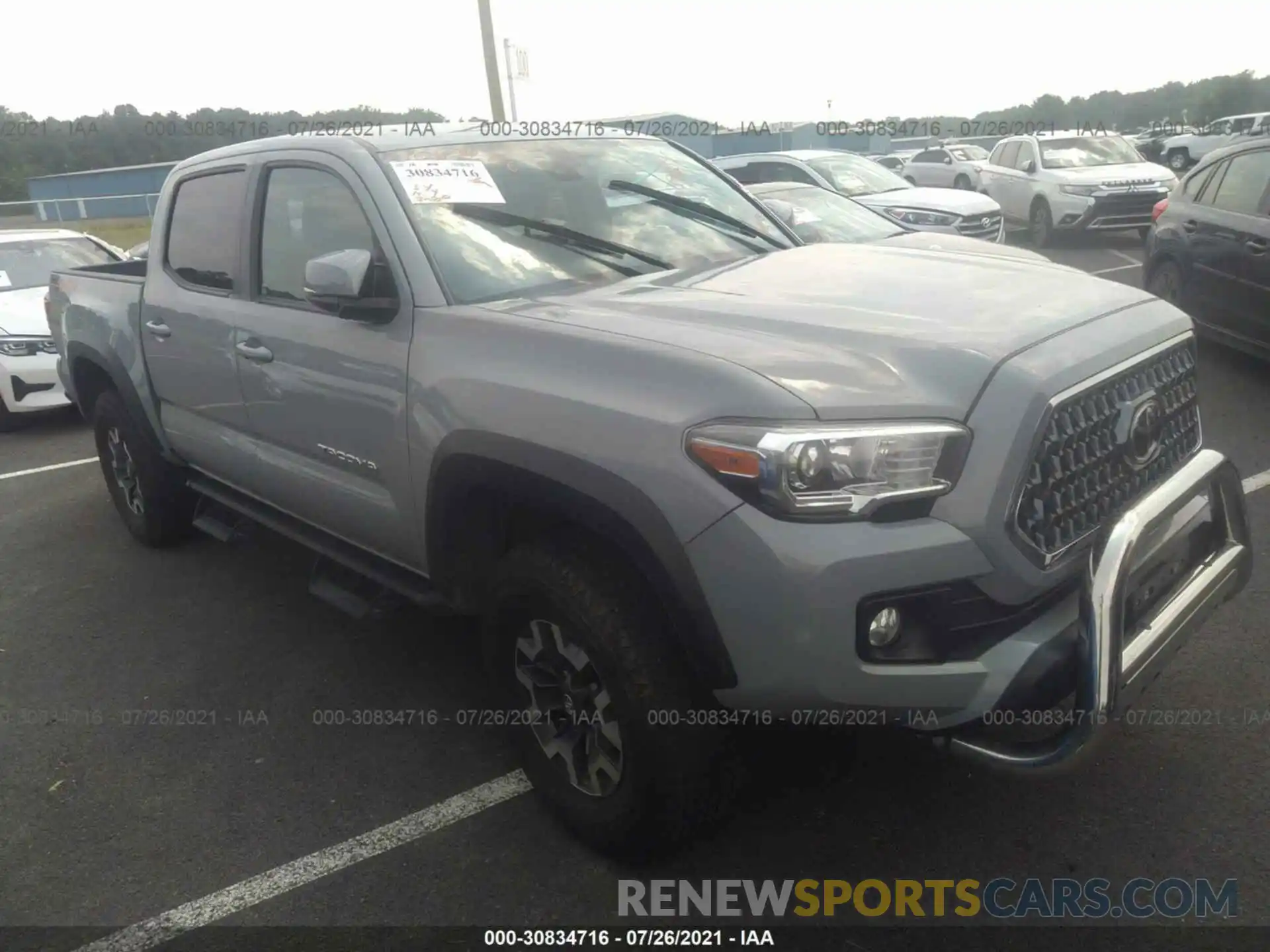 1 Photograph of a damaged car 3TMCZ5AN1KM260661 TOYOTA TACOMA 4WD 2019