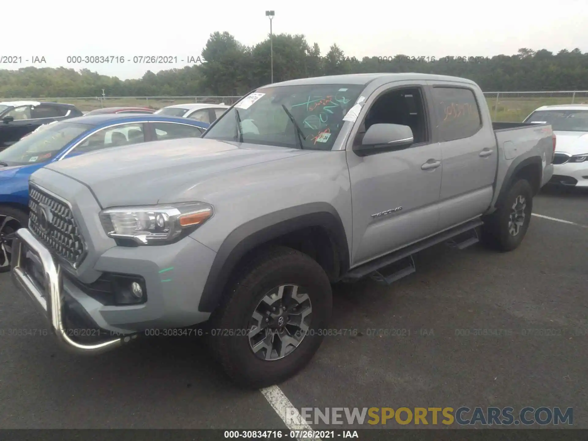 2 Photograph of a damaged car 3TMCZ5AN1KM260661 TOYOTA TACOMA 4WD 2019