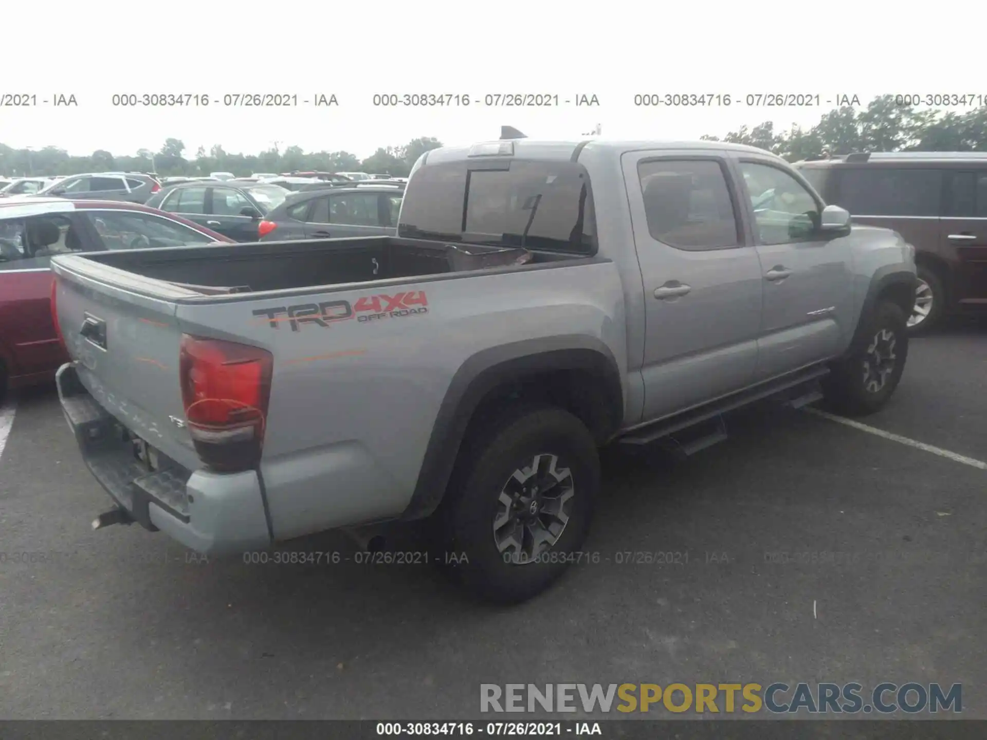 4 Photograph of a damaged car 3TMCZ5AN1KM260661 TOYOTA TACOMA 4WD 2019