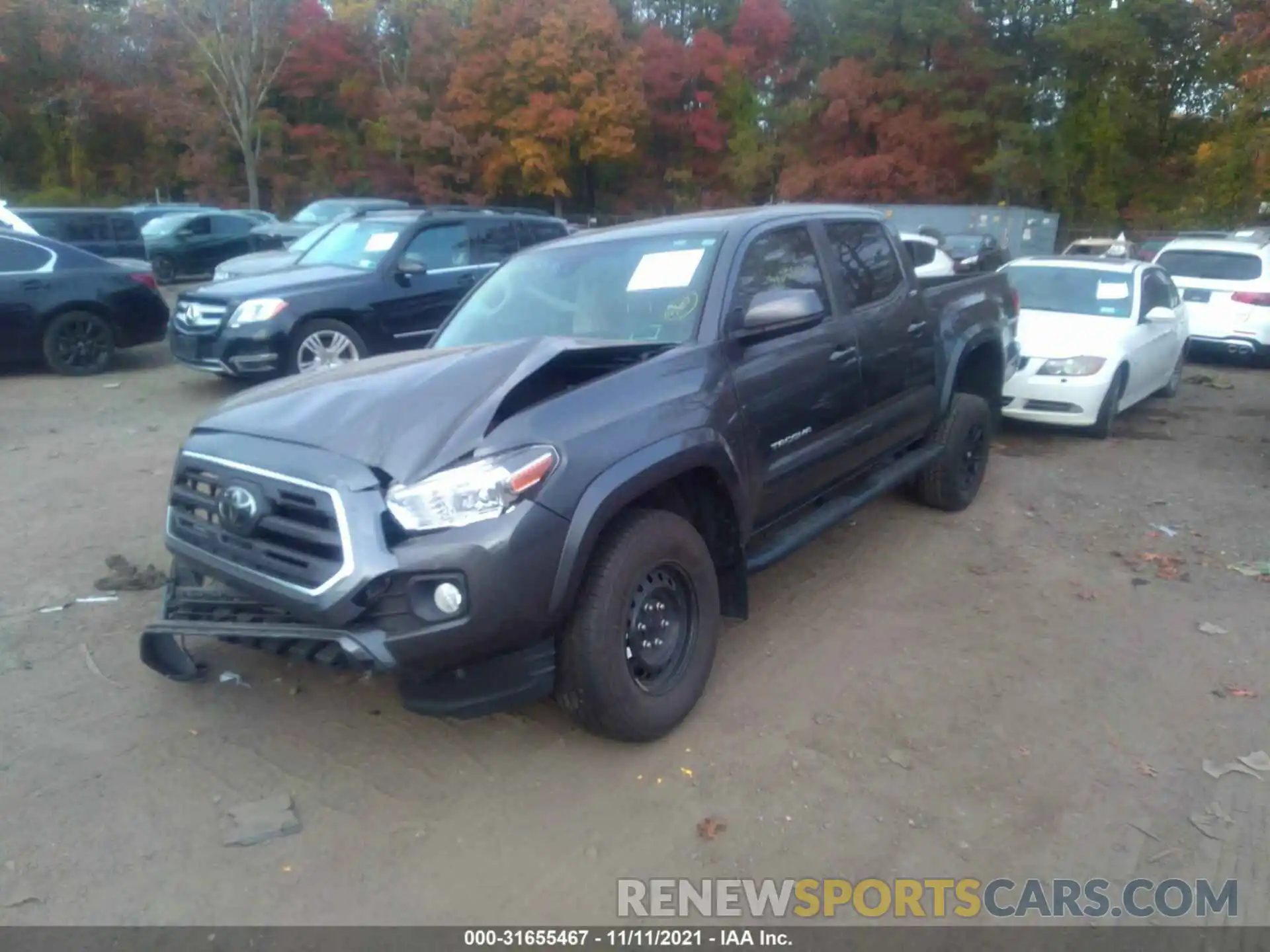 2 Photograph of a damaged car 3TMCZ5AN1KM272468 TOYOTA TACOMA 4WD 2019