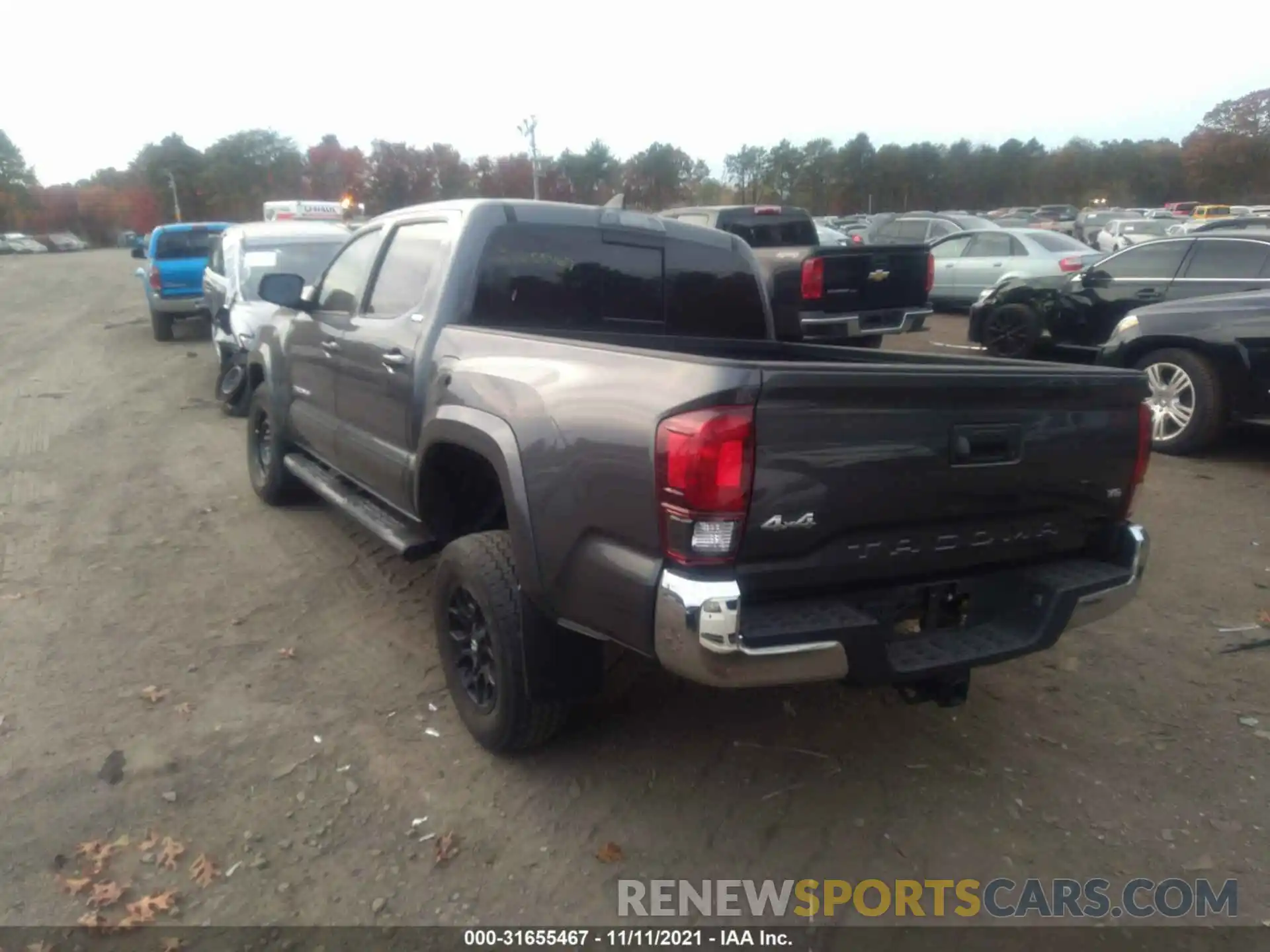 3 Photograph of a damaged car 3TMCZ5AN1KM272468 TOYOTA TACOMA 4WD 2019