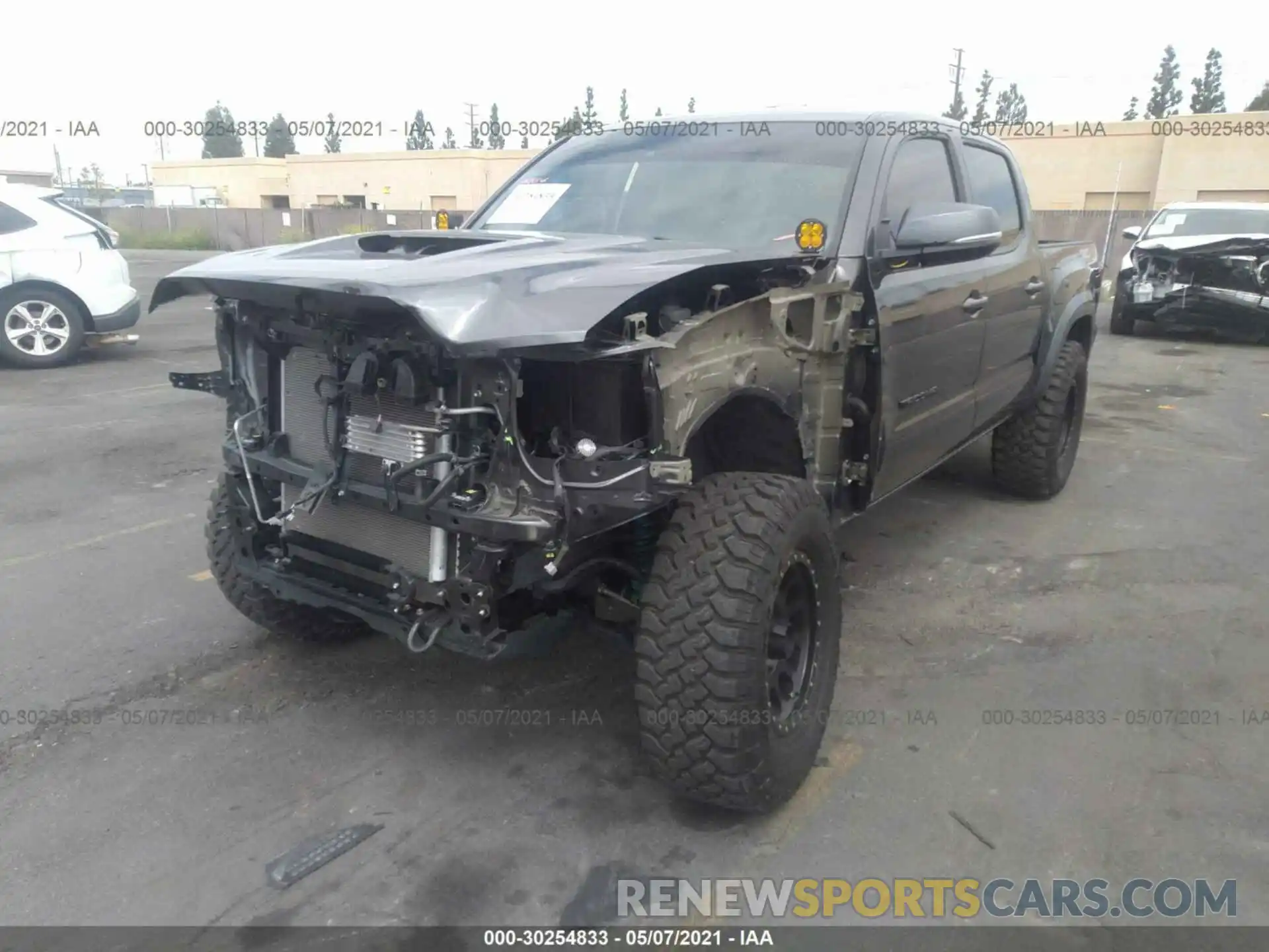 2 Photograph of a damaged car 3TMCZ5AN1KM275337 TOYOTA TACOMA 4WD 2019