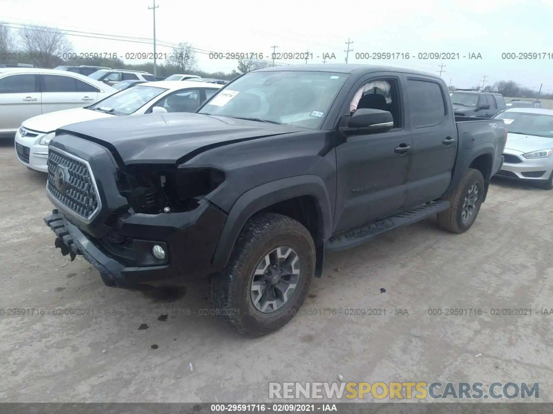 2 Photograph of a damaged car 3TMCZ5AN1KM277489 TOYOTA TACOMA 4WD 2019