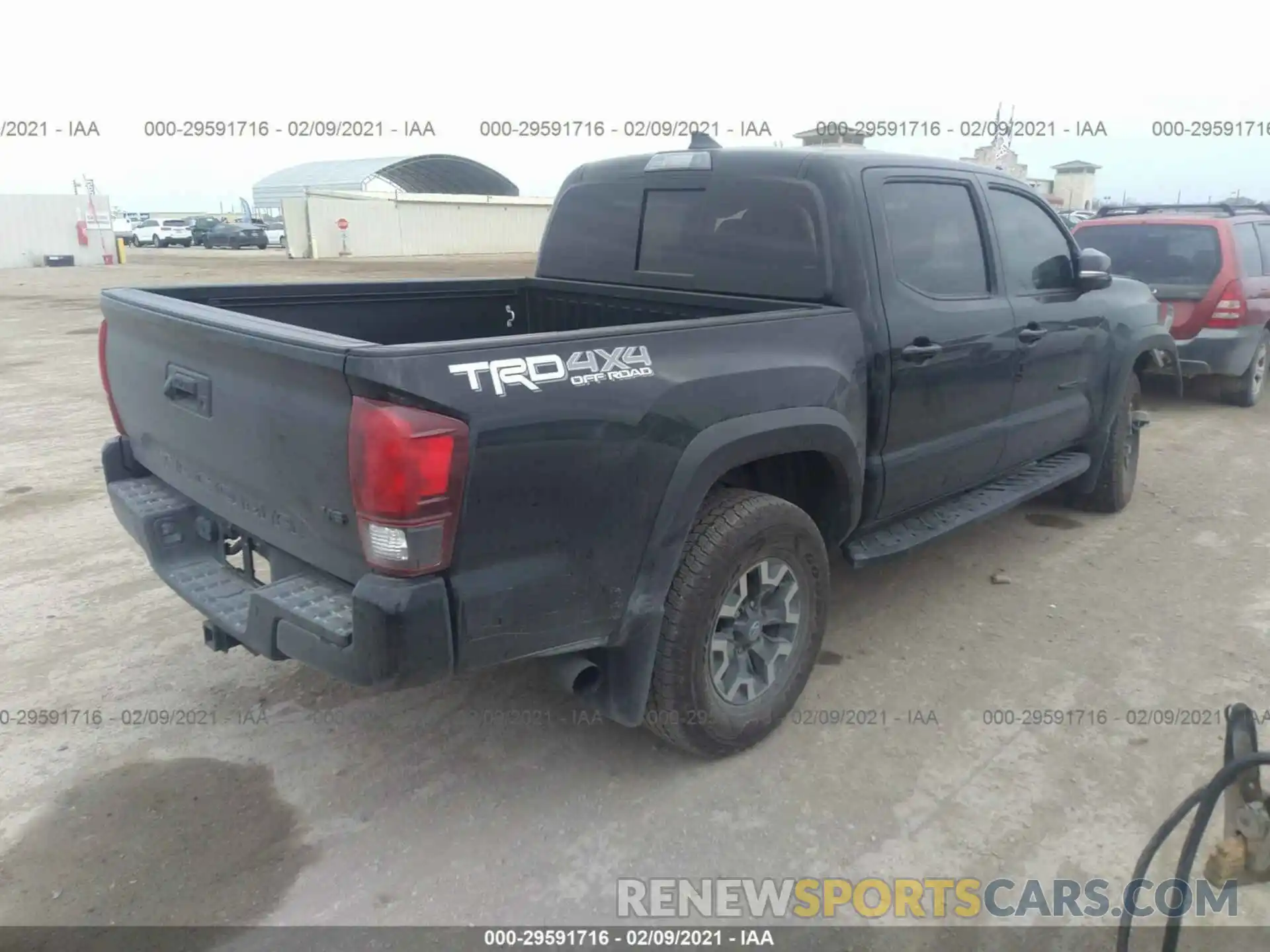 4 Photograph of a damaged car 3TMCZ5AN1KM277489 TOYOTA TACOMA 4WD 2019