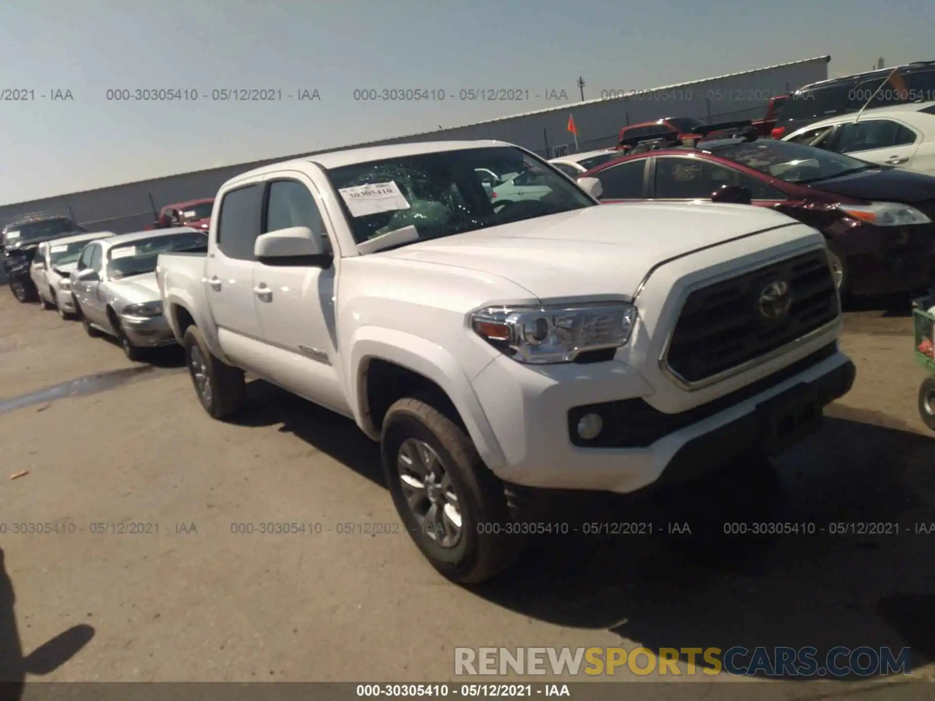 1 Photograph of a damaged car 3TMCZ5AN1KM277525 TOYOTA TACOMA 4WD 2019