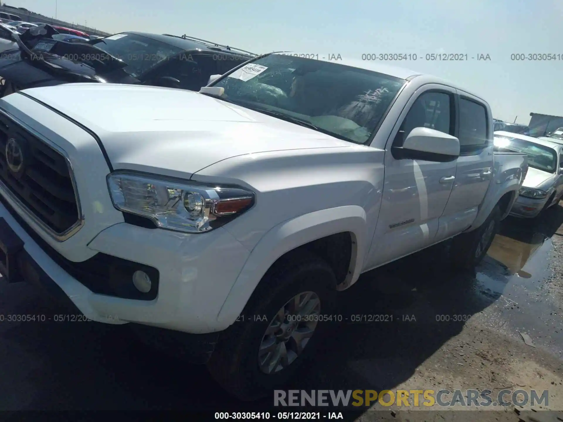 2 Photograph of a damaged car 3TMCZ5AN1KM277525 TOYOTA TACOMA 4WD 2019