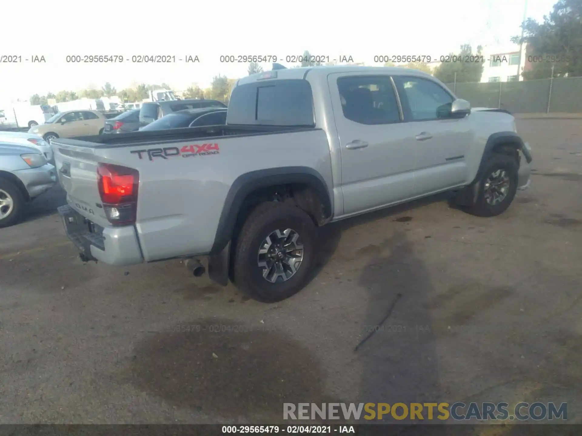 4 Photograph of a damaged car 3TMCZ5AN1KM282689 TOYOTA TACOMA 4WD 2019