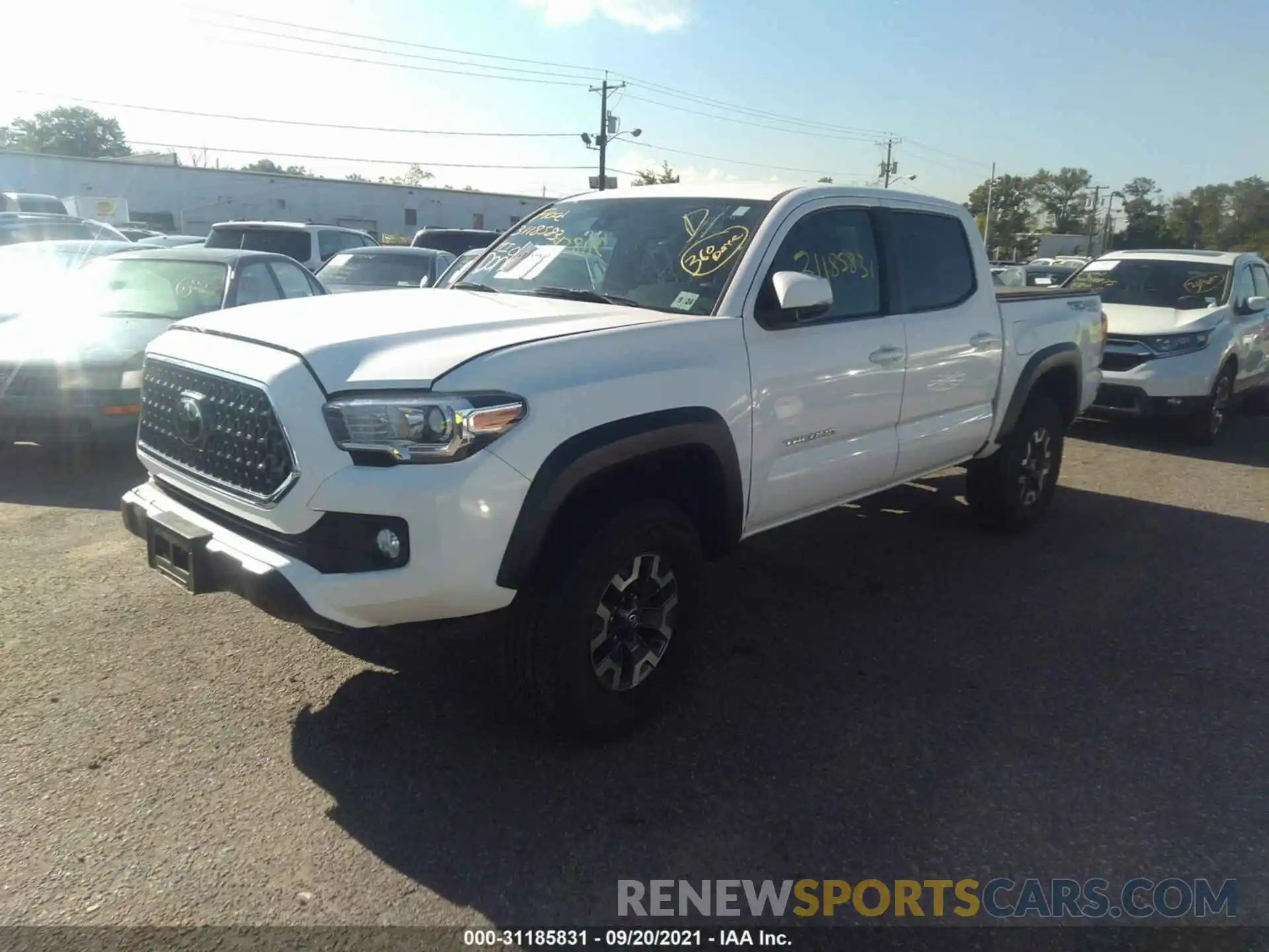 2 Photograph of a damaged car 3TMCZ5AN1KM282708 TOYOTA TACOMA 4WD 2019