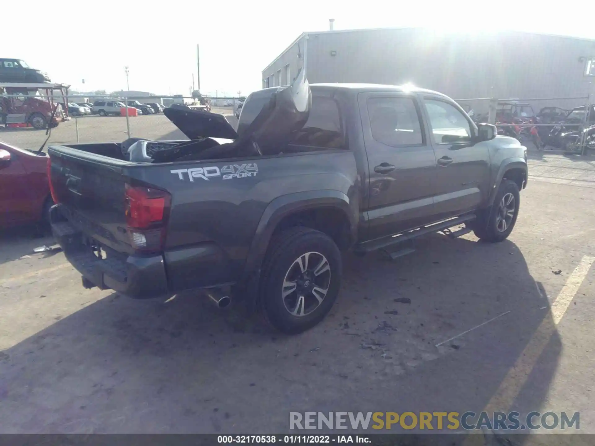 4 Photograph of a damaged car 3TMCZ5AN1KM284233 TOYOTA TACOMA 4WD 2019