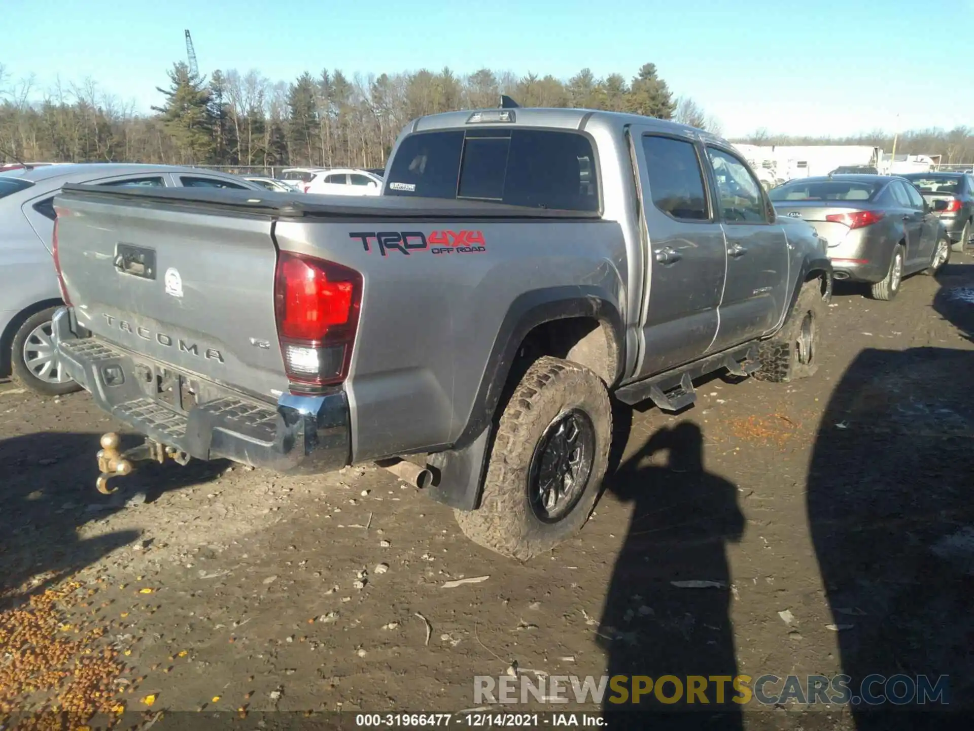 4 Photograph of a damaged car 3TMCZ5AN1KM284281 TOYOTA TACOMA 4WD 2019