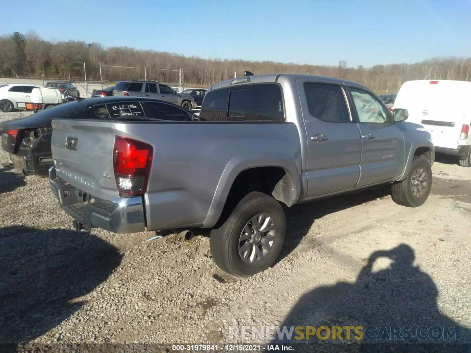 4 Photograph of a damaged car 3TMCZ5AN2KM216118 TOYOTA TACOMA 4WD 2019