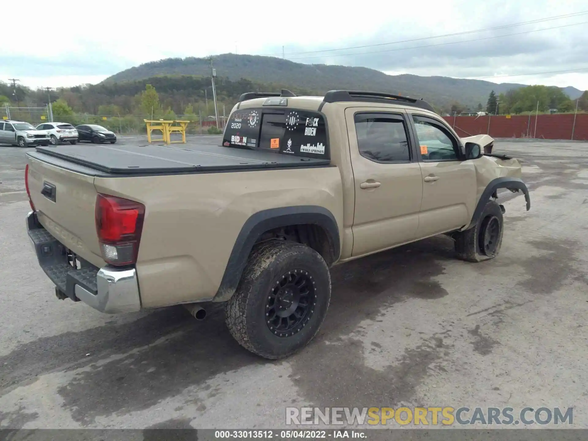 4 Photograph of a damaged car 3TMCZ5AN2KM227443 TOYOTA TACOMA 4WD 2019