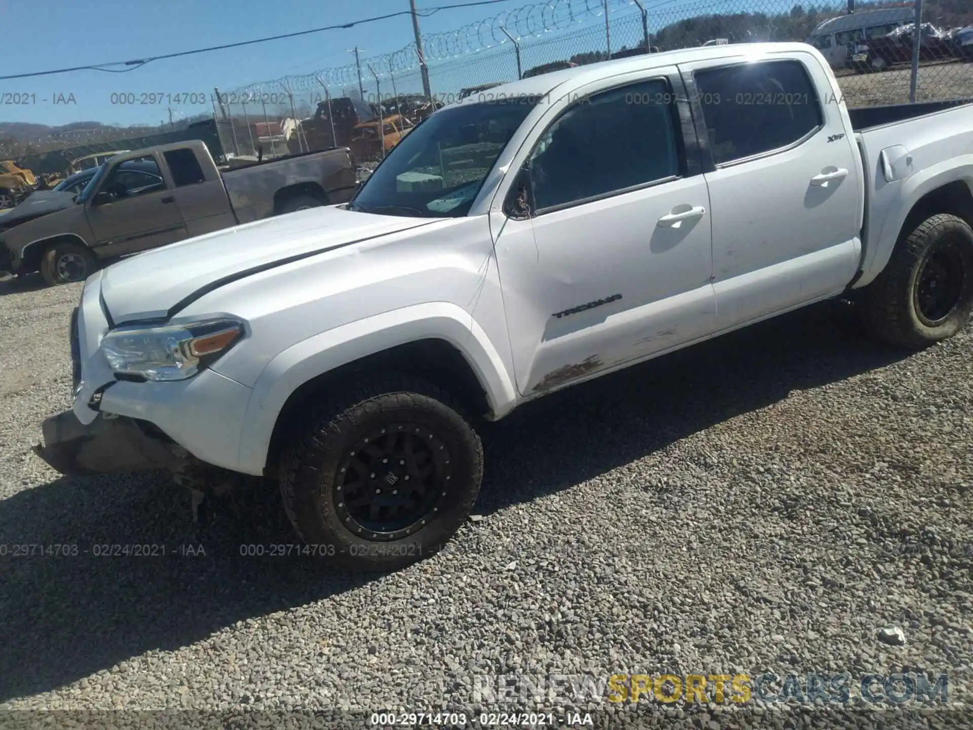 2 Photograph of a damaged car 3TMCZ5AN2KM227703 TOYOTA TACOMA 4WD 2019