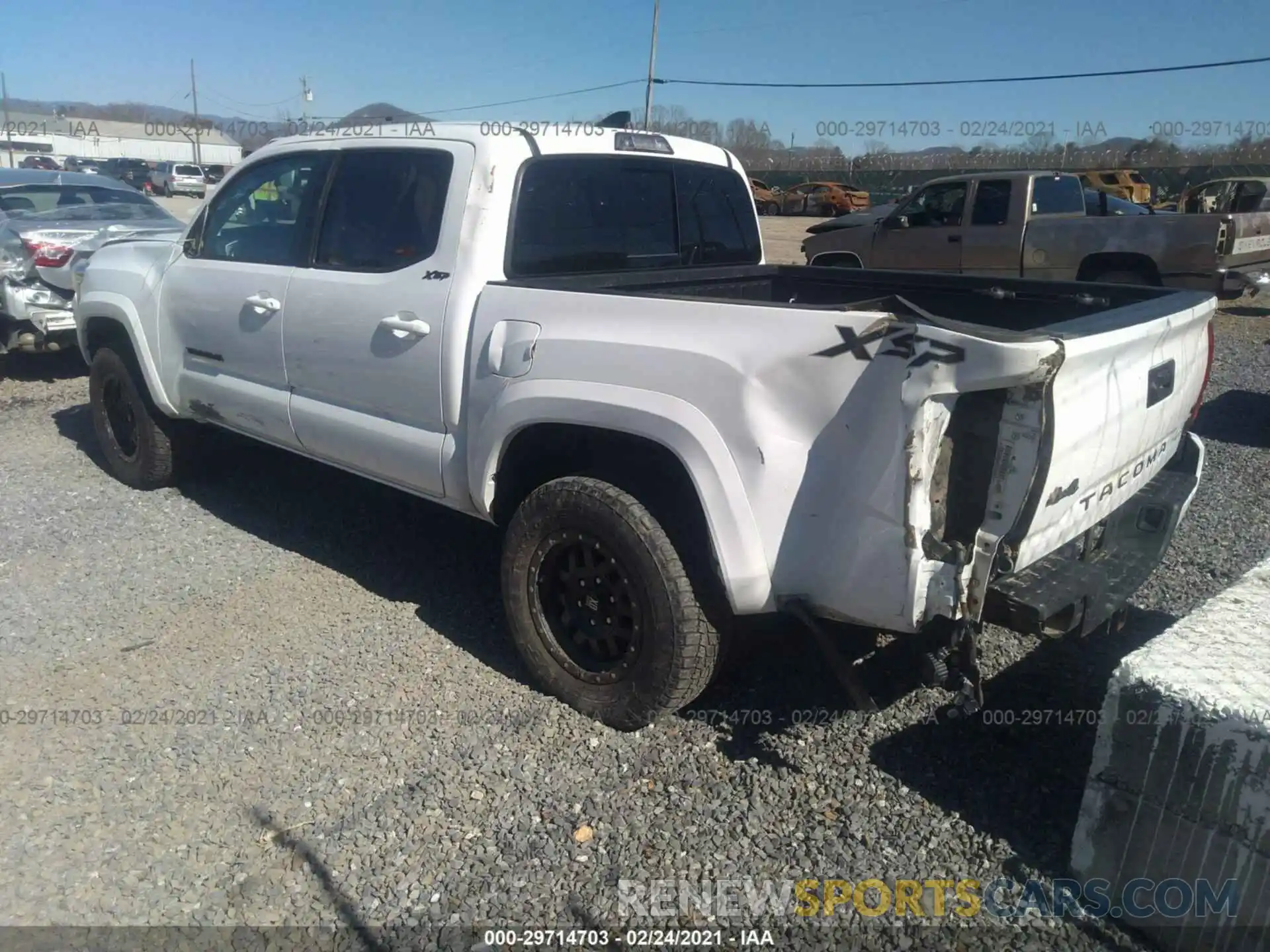 3 Photograph of a damaged car 3TMCZ5AN2KM227703 TOYOTA TACOMA 4WD 2019