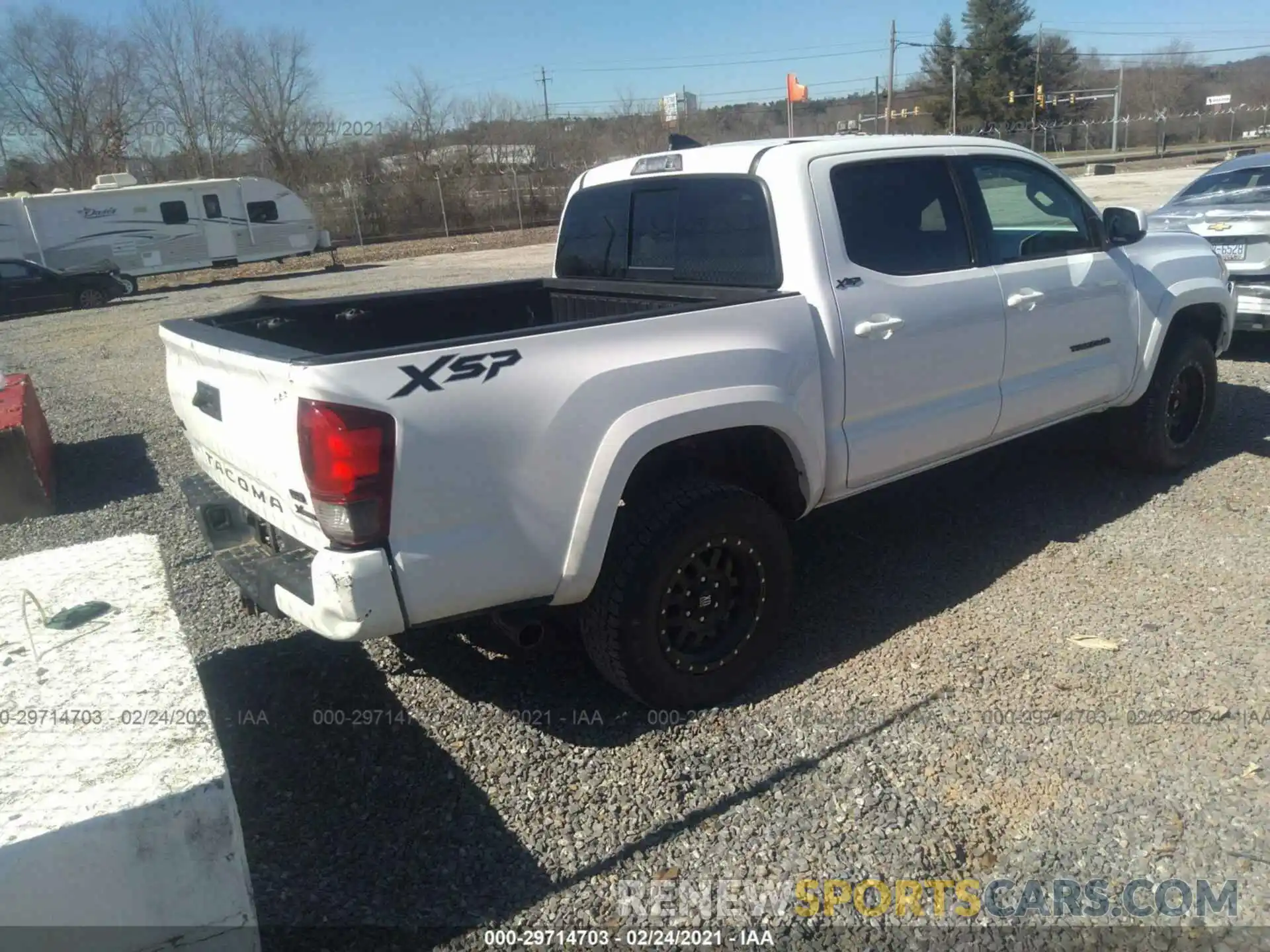 4 Photograph of a damaged car 3TMCZ5AN2KM227703 TOYOTA TACOMA 4WD 2019