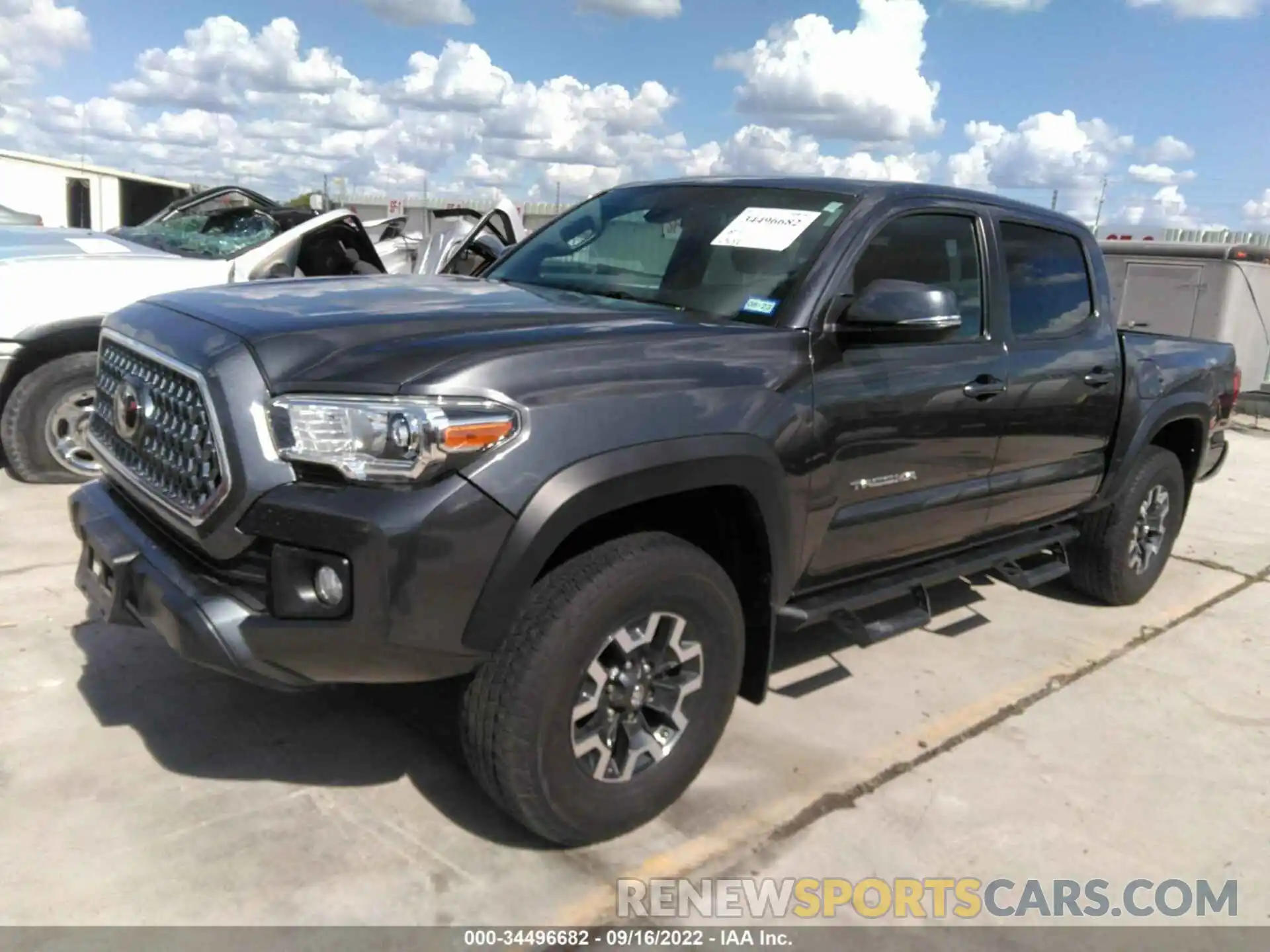 2 Photograph of a damaged car 3TMCZ5AN2KM240368 TOYOTA TACOMA 4WD 2019