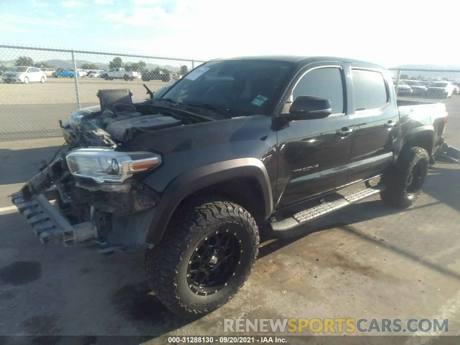 2 Photograph of a damaged car 3TMCZ5AN2KM241925 TOYOTA TACOMA 4WD 2019