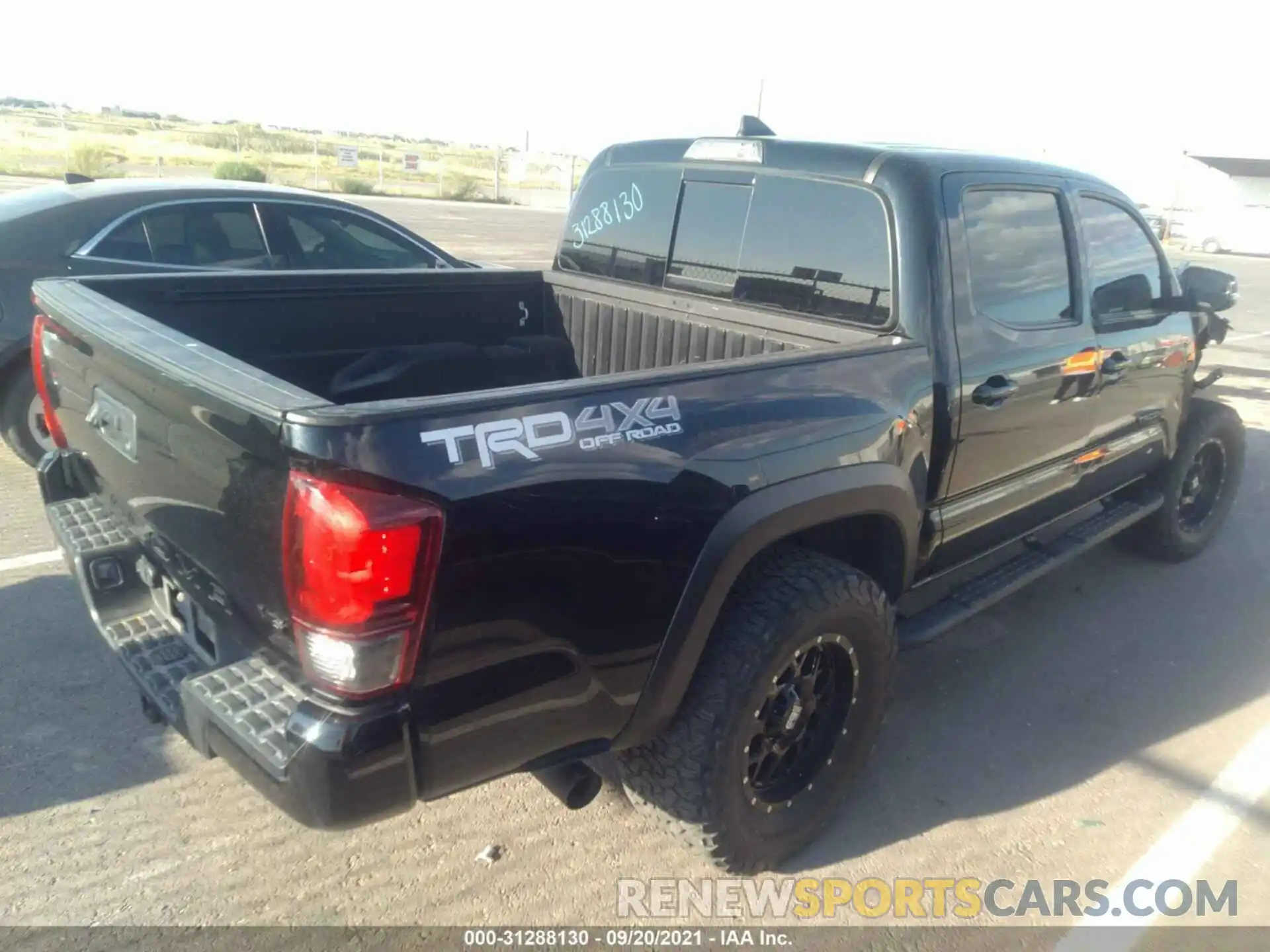 4 Photograph of a damaged car 3TMCZ5AN2KM241925 TOYOTA TACOMA 4WD 2019