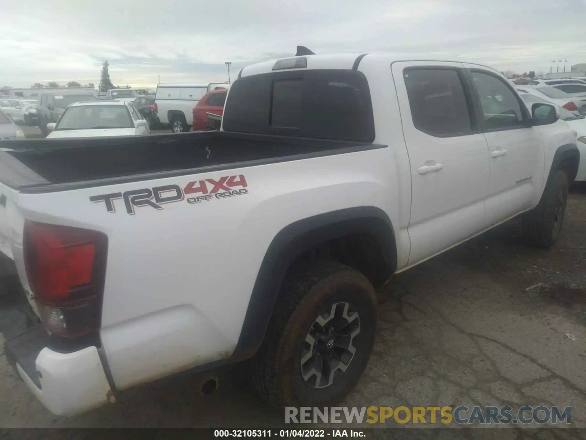 4 Photograph of a damaged car 3TMCZ5AN2KM246851 TOYOTA TACOMA 4WD 2019